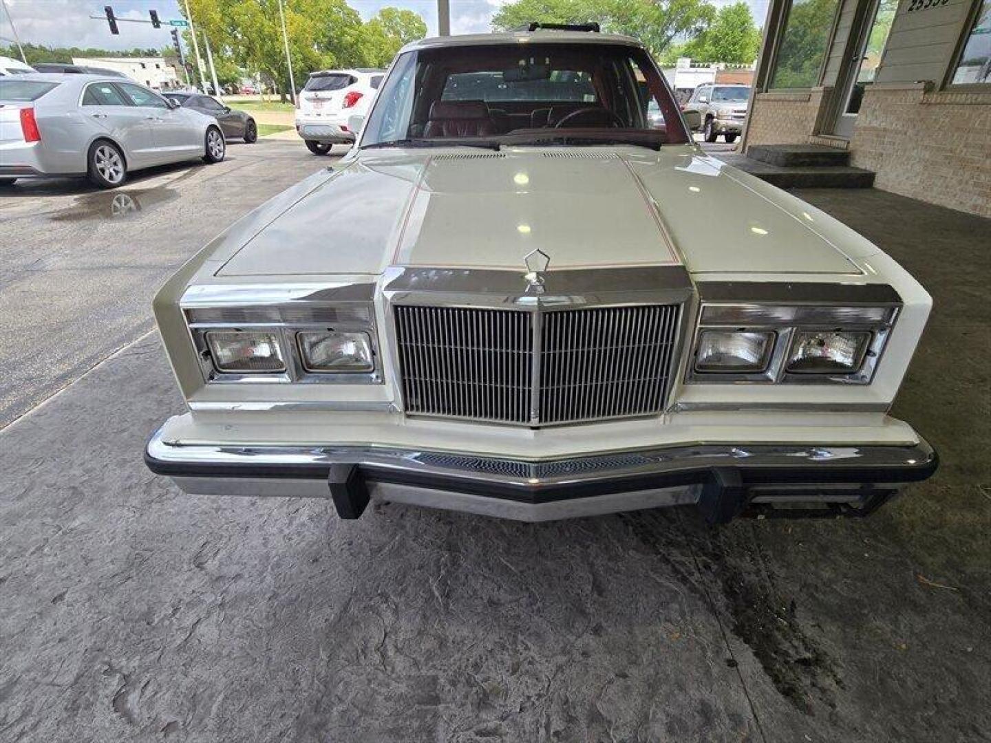 1984 White Chrysler Fifth Avenue (1C3BF66P0EX) with an 5.2L V8 130hp 235ft. lbs. engine, Automatic transmission, located at 25355 Eames Street, Channahon, IL, 60410, (815) 467-1807, 41.429108, -88.228432 - Step back in time with this vintage 1984 Chrysler Fifth Avenue that's as sassy as they come! Powered by a 5.2L V8 engine pumping out 130hp and 235ft. lbs. of torque, this classic beauty is ready to hit the streets with style. Decked out in a sleek White exterior and a bold Red interior, this Fifth - Photo#16