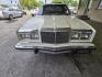 1984 White Chrysler Fifth Avenue (1C3BF66P0EX) with an 5.2L V8 130hp 235ft. lbs. engine, Automatic transmission, located at 25355 Eames Street, Channahon, IL, 60410, (815) 467-1807, 41.429108, -88.228432 - Step back in time with this vintage 1984 Chrysler Fifth Avenue that's as sassy as they come! Powered by a 5.2L V8 engine pumping out 130hp and 235ft. lbs. of torque, this classic beauty is ready to hit the streets with style. Decked out in a sleek White exterior and a bold Red interior, this Fifth - Photo#16