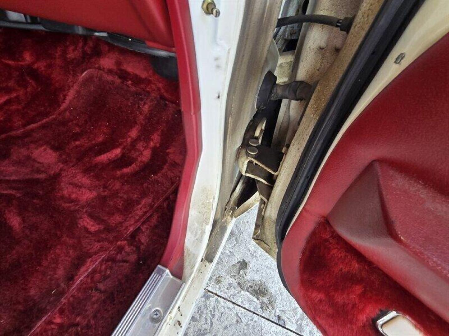 1984 White Chrysler Fifth Avenue (1C3BF66P0EX) with an 5.2L V8 130hp 235ft. lbs. engine, Automatic transmission, located at 25355 Eames Street, Channahon, IL, 60410, (815) 467-1807, 41.429108, -88.228432 - Step back in time with this vintage 1984 Chrysler Fifth Avenue that's as sassy as they come! Powered by a 5.2L V8 engine pumping out 130hp and 235ft. lbs. of torque, this classic beauty is ready to hit the streets with style. Decked out in a sleek White exterior and a bold Red interior, this Fifth - Photo#40