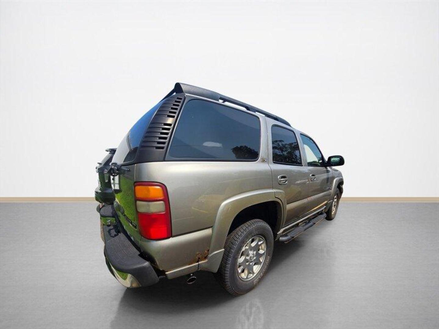 2003 Dark Gray Metallic Chevrolet Tahoe Z71 (1GNEK13Z83R) with an 5.3 engine, Automatic transmission, located at 25355 Eames Street, Channahon, IL, 60410, (815) 467-1807, 41.429108, -88.228432 - Photo#1