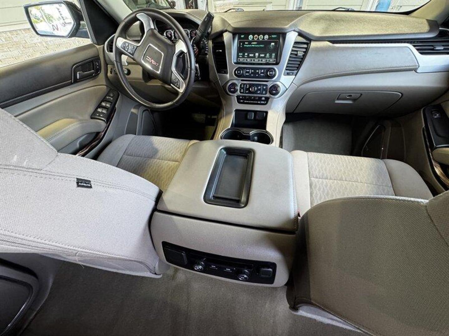 2017 Onyx Black GMC Yukon SLE (1GKS2AKC9HR) with an EcoTec3 5.3L Flex Fuel V8 355hp 383ft. lbs. engine, Automatic transmission, located at 25355 Eames Street, Channahon, IL, 60410, (815) 467-1807, 41.429108, -88.228432 - Behold the 2017 GMC Yukon SLE, a beast on wheels ready to conquer the roads with its EcoTec3 5.3L Flex Fuel V8 engine, pumping out a mighty 355hp and 383ft. lbs. of torque. This bad boy comes in sleek Black on the outside, matching its bold and luxurious Black interior. Straight outta the factory, - Photo#14