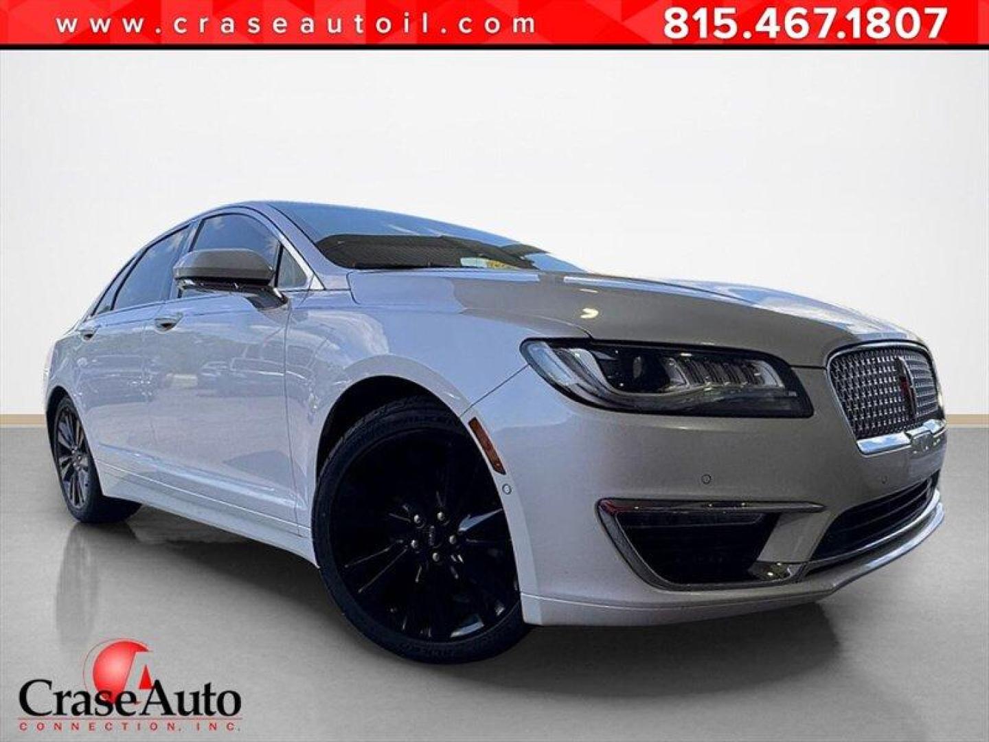2019 White Platinum Tri-Coat Lincoln MKZ Hybrid Hybrid Reserve (3LN6L5MU2KR) with an 2.0 engine, Automatic transmission, located at 25355 Eames Street, Channahon, IL, 60410, (815) 467-1807, 41.429108, -88.228432 - Introducing the sophisticated and eco-friendly 2019 Lincoln MKZ Hybrid Reserve II. Equipped with a powerful 2.0-liter engine, this luxury sedan offers a seamless blend of performance and efficiency. The factory default features of the Lincoln MKZ Hybrid Reserve II are designed to elevate your drivi - Photo#0