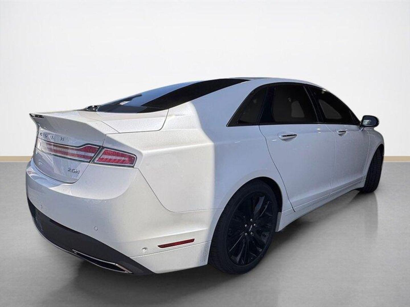 2019 White Platinum Tri-Coat Lincoln MKZ Hybrid Hybrid Reserve (3LN6L5MU2KR) with an 2.0 engine, Automatic transmission, located at 25355 Eames Street, Channahon, IL, 60410, (815) 467-1807, 41.429108, -88.228432 - Introducing the sophisticated and eco-friendly 2019 Lincoln MKZ Hybrid Reserve II. Equipped with a powerful 2.0-liter engine, this luxury sedan offers a seamless blend of performance and efficiency. The factory default features of the Lincoln MKZ Hybrid Reserve II are designed to elevate your drivi - Photo#2