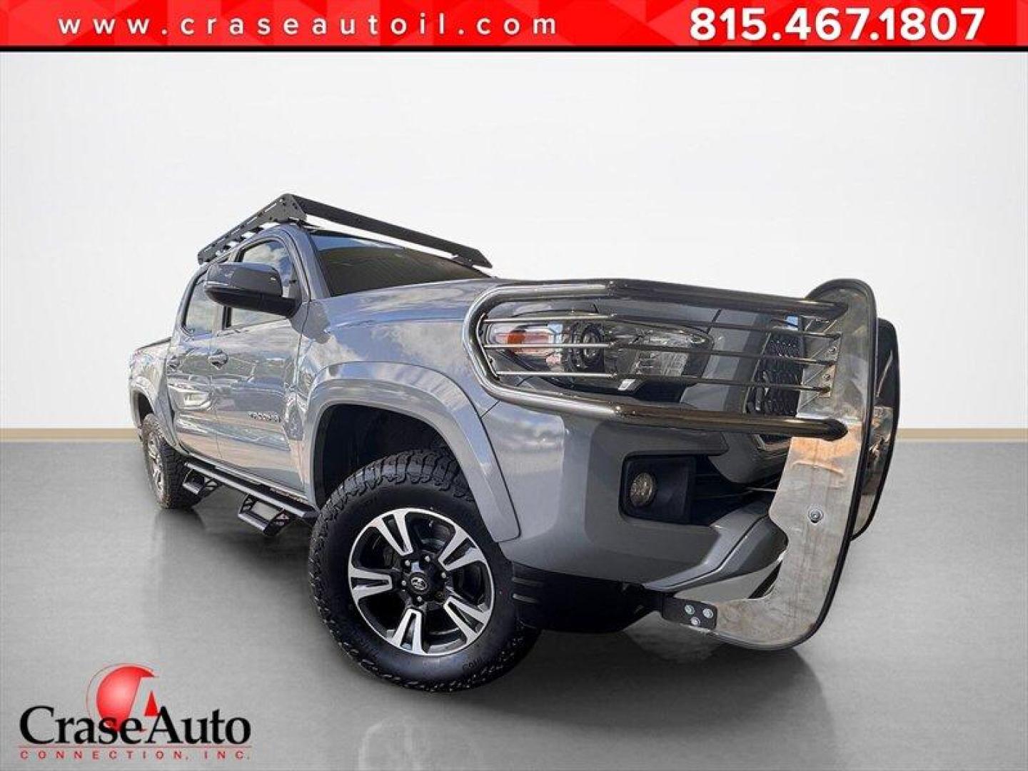 2018 Magnetic Gray Metallic Toyota Tacoma SR V6 (3TMCZ5AN3JM) with an 3.5L V6 278hp 265ft. lbs. engine, Automatic transmission, located at 25355 Eames Street, Channahon, IL, 60410, (815) 467-1807, 41.429108, -88.228432 - Oh, honey, get ready to conquer the concrete jungle in style with the 2018 Toyota Tacoma SR V6. This bad boy is packing a punch with its 3.5L V6 engine that delivers a roaring 278hp and 265ft. lbs. of torque. You'll be turning heads left and right with its sleek Magnetic Gray Metallic exterior and a - Photo#0