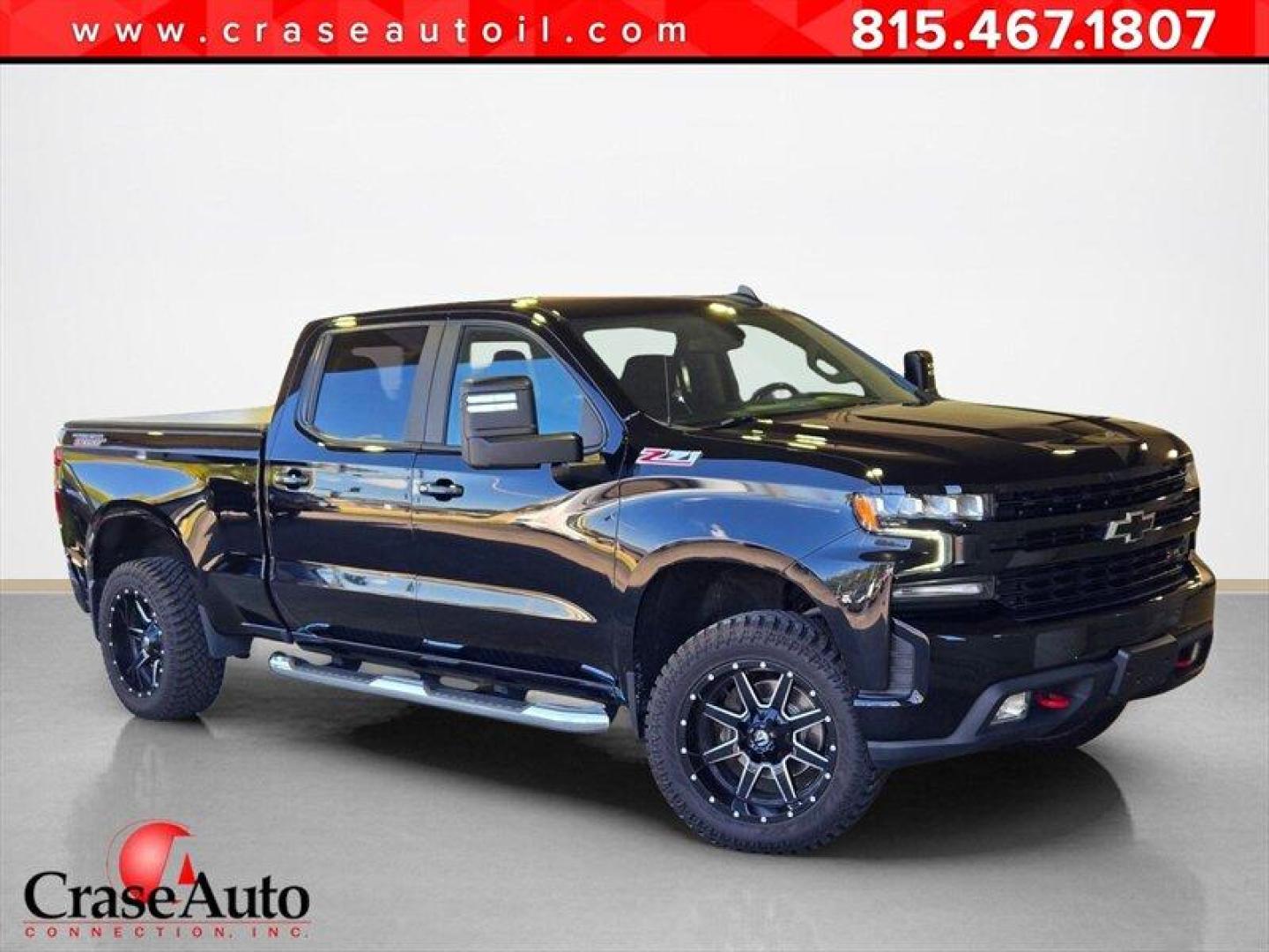 2021 Black Chevrolet Silverado 1500 LT Trail Boss (1GCPYFED5MZ) with an EcoTec3 5.3L V8 355hp 383ft. lbs. engine, Automatic transmission, located at 25355 Eames Street, Channahon, IL, 60410, (815) 467-1807, 41.429108, -88.228432 - Behold, the mighty 2021 Chevrolet Silverado 1500 LT Trail Boss! This bad boy is equipped with a ferocious EcoTec3 5.3L V8 engine, pumping out a beastly 355 horsepower and 383 ft. lbs. of torque. It's like having a herd of wild stallions under the hood, ready to gallop at the tap of your foot. Now, - Photo#0