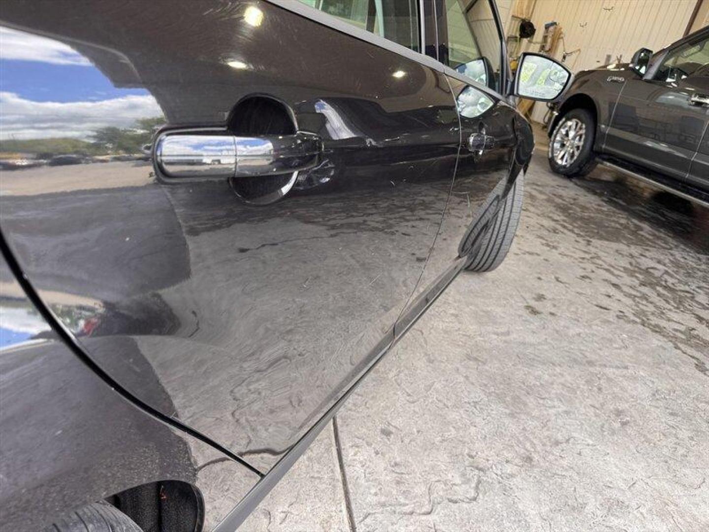 2012 Black Ford Focus SE (1FAHP3K23CL) with an 2.0L I4 160hp 146ft. lbs. engine, 5 Speed Manual transmission, located at 25355 Eames Street, Channahon, IL, 60410, (815) 467-1807, 41.429108, -88.228432 - Introducing the stylish and efficient 2012 Ford Focus SE in the sleek Tuxedo Black Metallic exterior color! This compact car is powered by a reliable 2.0L I4 engine, delivering a peppy 160hp and 146ft. lbs. of torque for a fun driving experience. Step inside the Charcoal Black interior and enjoy th - Photo#10