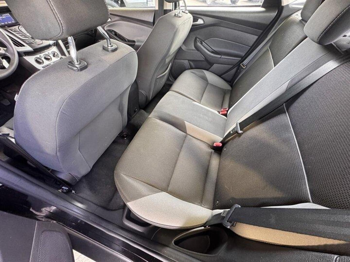 2012 Black Ford Focus SE (1FAHP3K23CL) with an 2.0L I4 160hp 146ft. lbs. engine, 5 Speed Manual transmission, located at 25355 Eames Street, Channahon, IL, 60410, (815) 467-1807, 41.429108, -88.228432 - Introducing the stylish and efficient 2012 Ford Focus SE in the sleek Tuxedo Black Metallic exterior color! This compact car is powered by a reliable 2.0L I4 engine, delivering a peppy 160hp and 146ft. lbs. of torque for a fun driving experience. Step inside the Charcoal Black interior and enjoy th - Photo#15