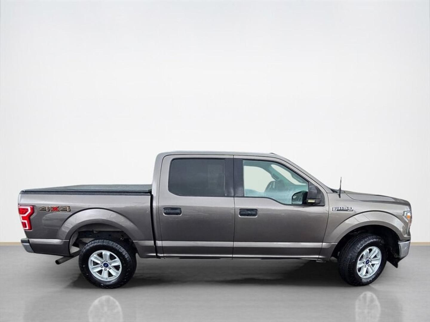 2018 Guard Ford F-150 XLT (1FTEW1EG1JF) with an EcoBoost 3.5L Twin Turbo V6 375hp 470ft. lbs. engine, Automatic transmission, located at 25355 Eames Street, Channahon, IL, 60410, (815) 467-1807, 41.429108, -88.228432 - The 2018 Ford F-150 XLT is powered by a robust EcoBoost 3.5L Twin Turbo V6 engine, delivering 375 horsepower and 470 lb-ft of torque. This combination provides strong performance and towing capability, making it a versatile choice for work and daily driving needs. The exterior of this model is fini- Photo#1