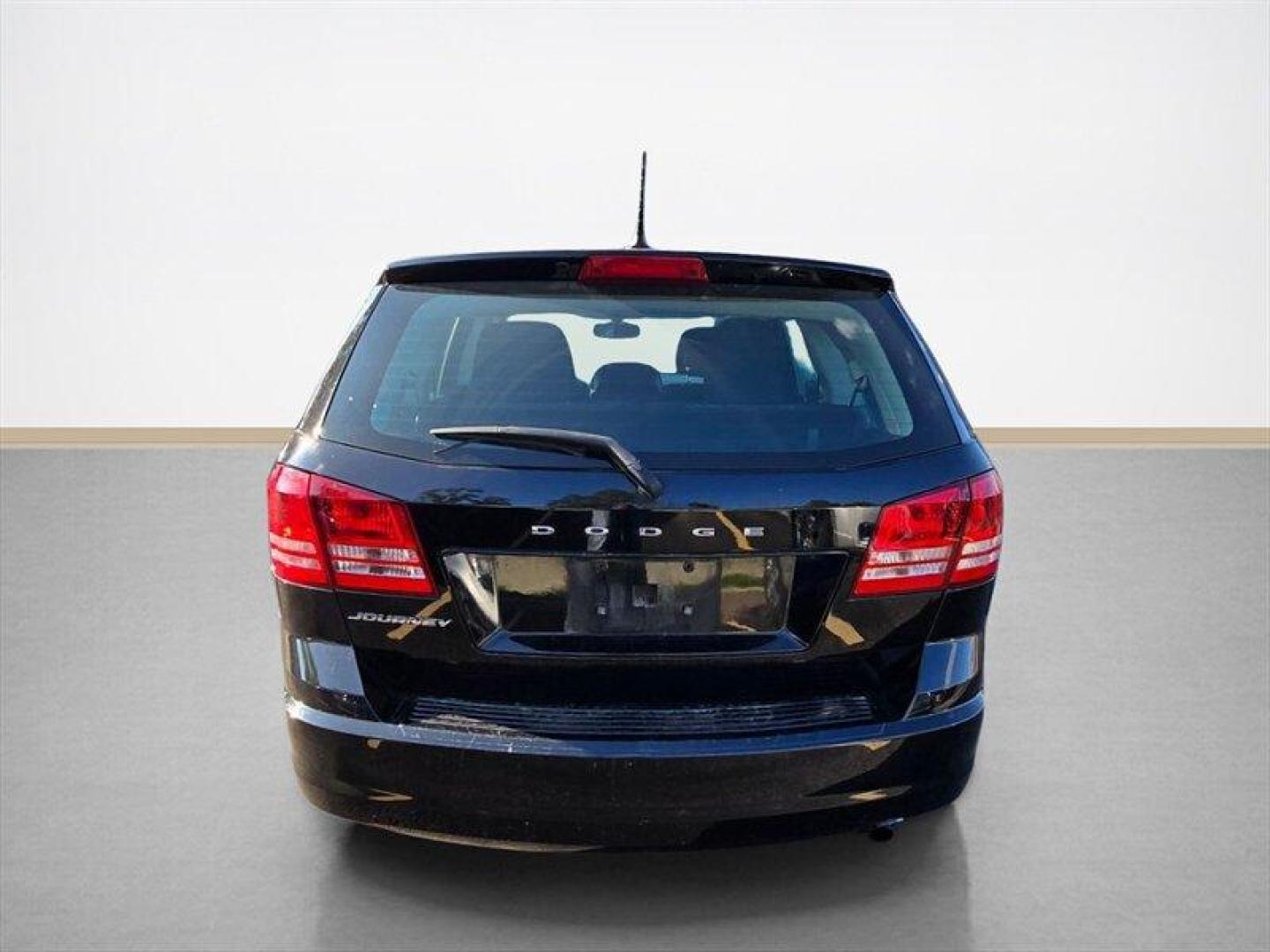 2014 Pitch Black Clear Coat Dodge Journey AVP (3C4PDCAB4ET) with an 2.4L I4 173hp 166ft. lbs. engine, Automatic transmission, located at 25355 Eames Street, Channahon, IL, 60410, (815) 467-1807, 41.429108, -88.228432 - ** LOCAL TRADE IN, WHOLESALE AS-IS SPECIAL, HAS LEAKS, NEEDS MINOR MAINTAINCE. ** This 2014 Dodge Journey AVP in Pitch Black Clear Coat with a Black interior is a reliable choice for those seeking a versatile SUV. Powered by a 2.4L I4 engine producing 173hp and 166ft. lbs. of torque, this vehicle st - Photo#4