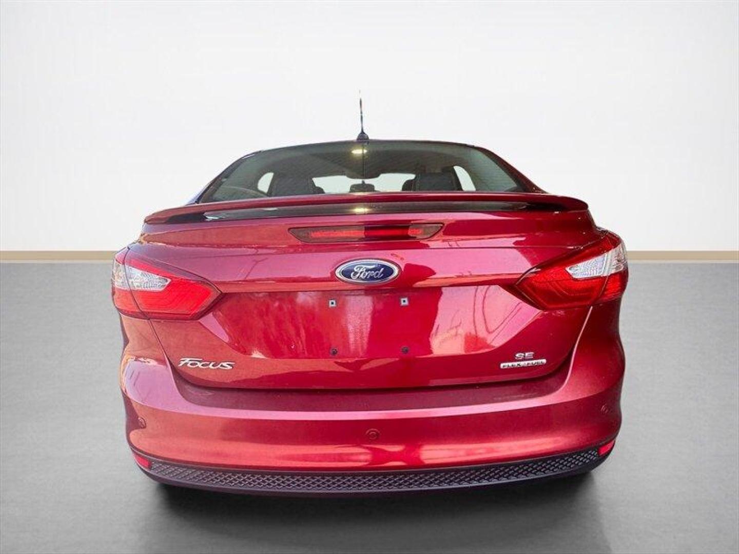 2013 Ruby Red Metallic Tinted Clear Coat Ford Focus SE (1FADP3F24DL) with an 2.0L Flex Fuel I4 160hp 146ft. lbs. engine, Automatic transmission, located at 25355 Eames Street, Channahon, IL, 60410, (815) 467-1807, 41.429108, -88.228432 - Introducing the vibrant and efficient 2013 Ford Focus SE in stunning Ruby Red Metallic Tinted Clear Coat! This compact beauty is powered by a zippy 2.0L Flex Fuel I4 engine, delivering a peppy 160hp and 146ft. lbs. of torque for a thrilling driving experience. Step inside the Charcoal Black interi - Photo#4