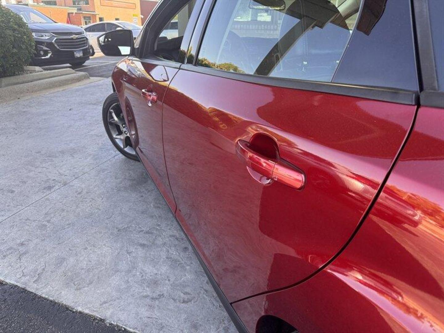 2013 Ruby Red Metallic Tinted Clear Coat Ford Focus SE (1FADP3F24DL) with an 2.0L Flex Fuel I4 160hp 146ft. lbs. engine, Automatic transmission, located at 25355 Eames Street, Channahon, IL, 60410, (815) 467-1807, 41.429108, -88.228432 - Introducing the vibrant and efficient 2013 Ford Focus SE in stunning Ruby Red Metallic Tinted Clear Coat! This compact beauty is powered by a zippy 2.0L Flex Fuel I4 engine, delivering a peppy 160hp and 146ft. lbs. of torque for a thrilling driving experience. Step inside the Charcoal Black interi - Photo#9