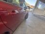 2013 Ruby Red Metallic Tinted Clear Coat Ford Focus SE (1FADP3F24DL) with an 2.0L Flex Fuel I4 160hp 146ft. lbs. engine, Automatic transmission, located at 25355 Eames Street, Channahon, IL, 60410, (815) 467-1807, 41.429108, -88.228432 - Introducing the vibrant and efficient 2013 Ford Focus SE in stunning Ruby Red Metallic Tinted Clear Coat! This compact beauty is powered by a zippy 2.0L Flex Fuel I4 engine, delivering a peppy 160hp and 146ft. lbs. of torque for a thrilling driving experience. Step inside the Charcoal Black interi - Photo#10