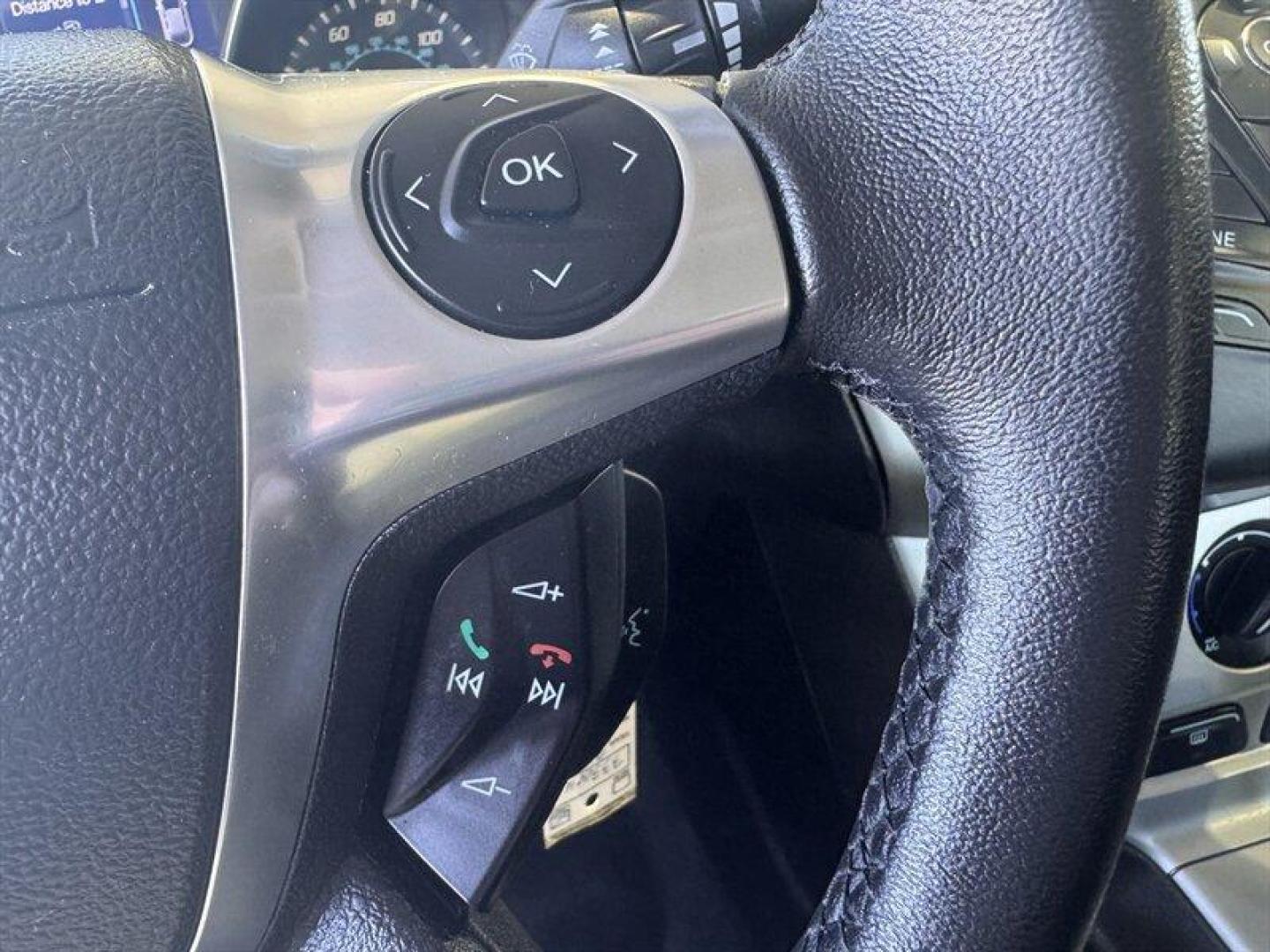 2013 Ruby Red Metallic Tinted Clear Coat Ford Focus SE (1FADP3F24DL) with an 2.0L Flex Fuel I4 160hp 146ft. lbs. engine, Automatic transmission, located at 25355 Eames Street, Channahon, IL, 60410, (815) 467-1807, 41.429108, -88.228432 - Introducing the vibrant and efficient 2013 Ford Focus SE in stunning Ruby Red Metallic Tinted Clear Coat! This compact beauty is powered by a zippy 2.0L Flex Fuel I4 engine, delivering a peppy 160hp and 146ft. lbs. of torque for a thrilling driving experience. Step inside the Charcoal Black interi - Photo#23