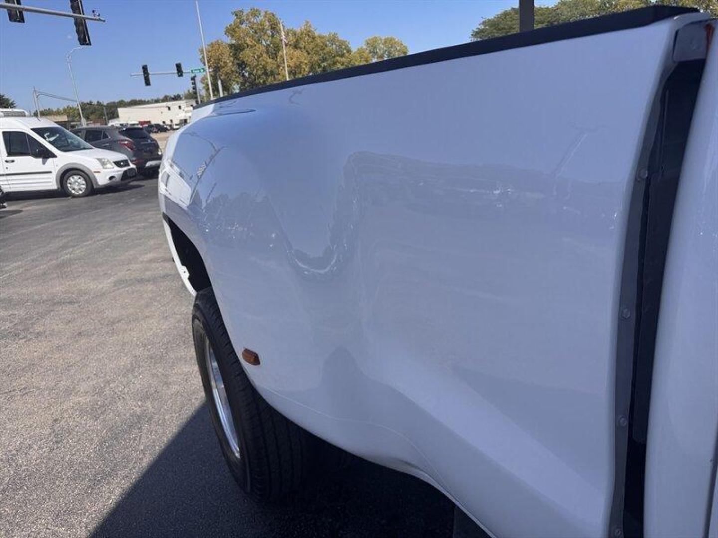 2014 Summit White Chevrolet Silverado 3500 LT (1GC4C0C88EF) with an Duramax 6.6L Diesel Turbo V8 397hp 765ft. lbs. engine, Automatic transmission, located at 25355 Eames Street, Channahon, IL, 60410, (815) 467-1807, 41.429108, -88.228432 - Behold the majestic 2014 Chevrolet Silverado 3500 LT, a true titan among trucks! This powerhouse is equipped with a formidable Duramax 6.6L Diesel Turbo V8 engine, boasting an impressive 397hp and a staggering 765ft. lbs. of torque. Its Summit White exterior exudes strength and elegance, while the E - Photo#12