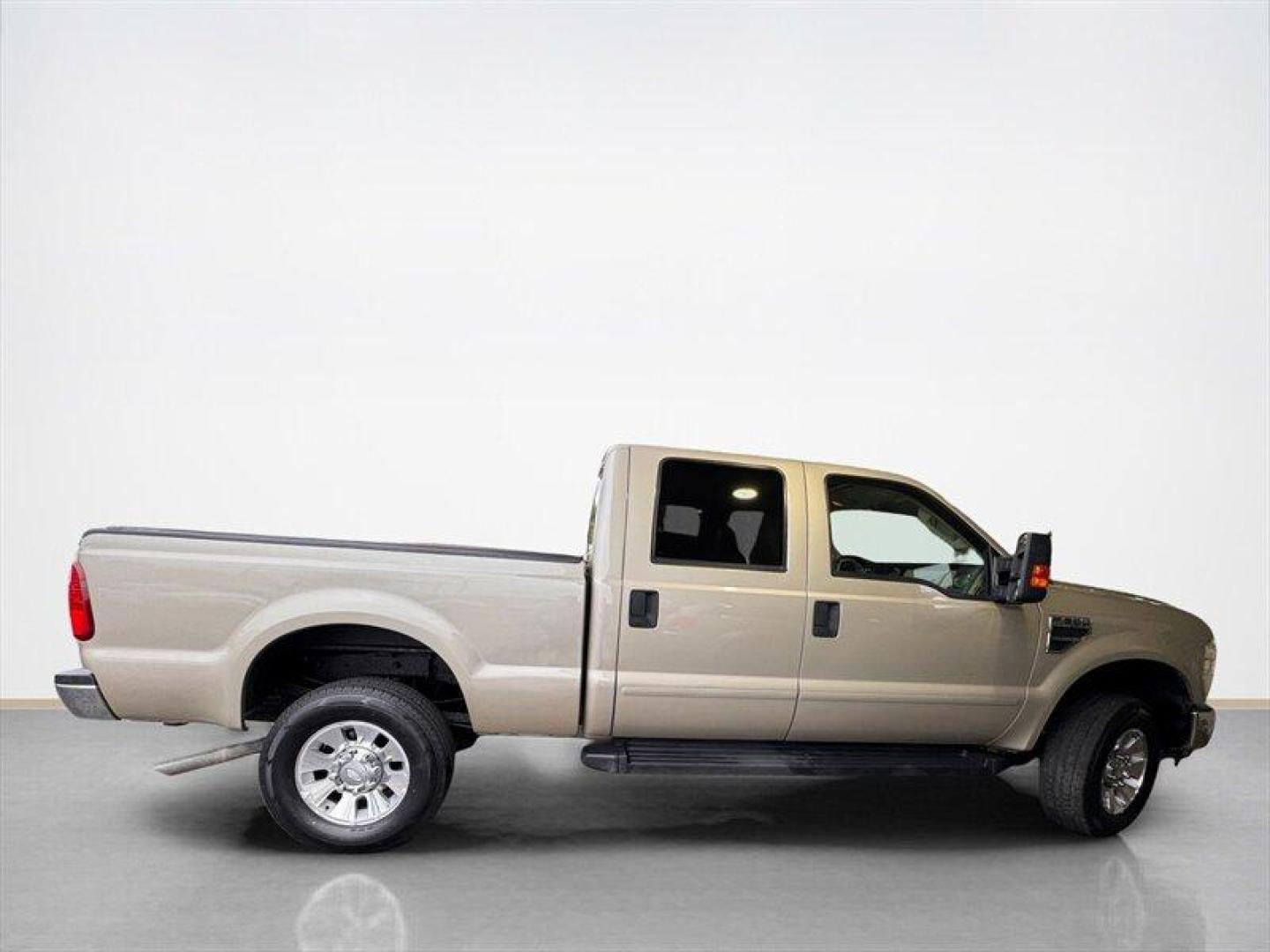 2008 Pueblo Gold Clearcoat Metallic Ford F-350 Lariat (1FTWW31Y38E) with an Triton 6.8L V10 362hp 457ft. lbs. engine, Automatic transmission, located at 25355 Eames Street, Channahon, IL, 60410, (815) 467-1807, 41.429108, -88.228432 - Behold the mighty 2008 Ford F-350 Super Duty Lariat Crew Cab, a beast of a truck with a heart of Triton 6.8L V10 power, belting out 362hp and 457ft. lbs. of torque! This bad boy comes dressed to impress in a stylish Pueblo Gold Clearcoat Metallic/Black exterior, ready to turn heads on the road. Ste - Photo#1