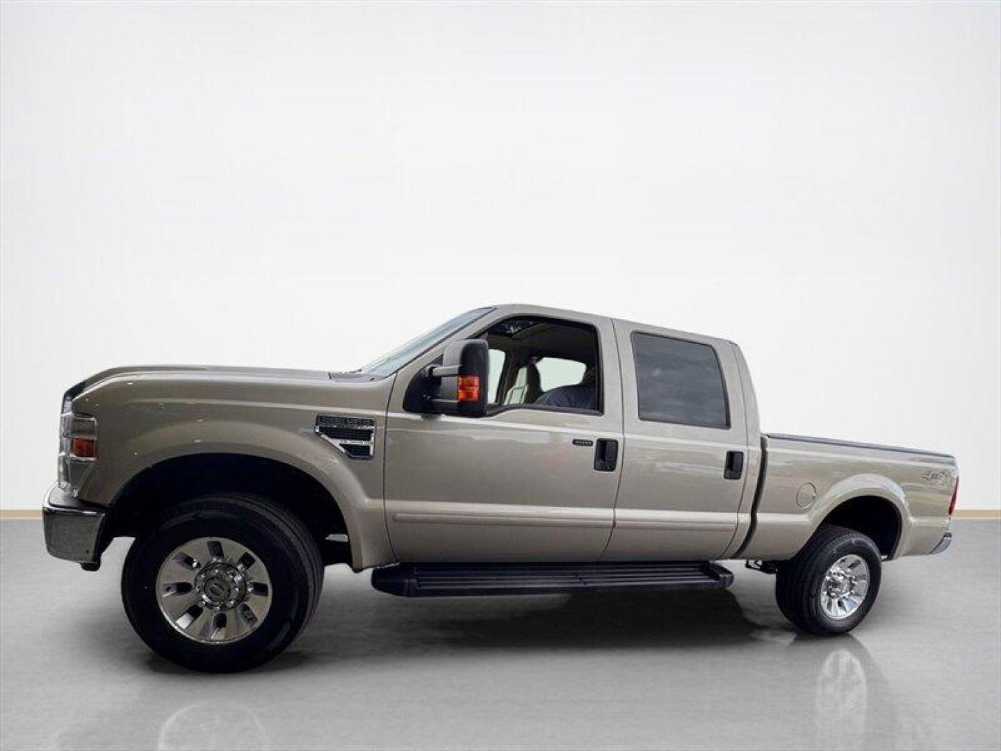 2008 Pueblo Gold Clearcoat Metallic Ford F-350 Lariat (1FTWW31Y38E) with an Triton 6.8L V10 362hp 457ft. lbs. engine, Automatic transmission, located at 25355 Eames Street, Channahon, IL, 60410, (815) 467-1807, 41.429108, -88.228432 - Behold the mighty 2008 Ford F-350 Super Duty Lariat Crew Cab, a beast of a truck with a heart of Triton 6.8L V10 power, belting out 362hp and 457ft. lbs. of torque! This bad boy comes dressed to impress in a stylish Pueblo Gold Clearcoat Metallic/Black exterior, ready to turn heads on the road. Ste - Photo#5