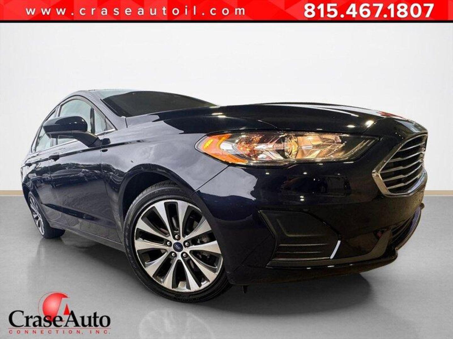 2020 Velocity Blue Ford Fusion SE (3FA6P0T90LR) with an EcoBoost 2.0L Turbo I4 245hp 275ft. lbs. engine, Automatic transmission, located at 25355 Eames Street, Channahon, IL, 60410, (815) 467-1807, 41.429108, -88.228432 - Introducing the sleek and stylish 2020 Ford Fusion SE in the eye-catching Alto Blue Metallic Tinted Clearcoat exterior and luxurious Ebony interior. Powered by a mighty EcoBoost 2.0L Turbo I4 engine, this baby churns out a whopping 245hp and 275ft. lbs. of torque. With less than 24,000 miles on the - Photo#0