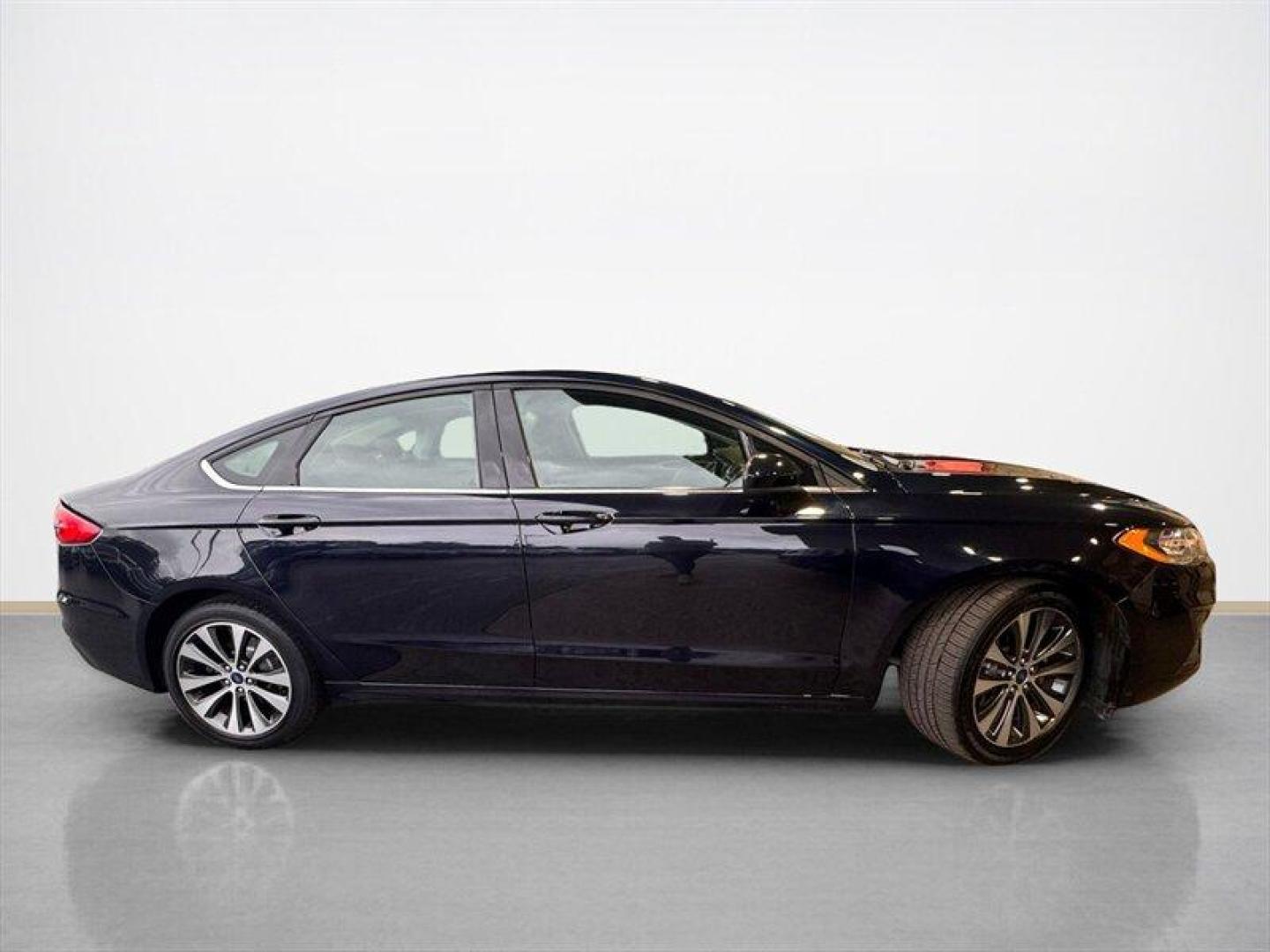 2020 Velocity Blue Ford Fusion SE (3FA6P0T90LR) with an EcoBoost 2.0L Turbo I4 245hp 275ft. lbs. engine, Automatic transmission, located at 25355 Eames Street, Channahon, IL, 60410, (815) 467-1807, 41.429108, -88.228432 - Introducing the sleek and stylish 2020 Ford Fusion SE in the eye-catching Alto Blue Metallic Tinted Clearcoat exterior and luxurious Ebony interior. Powered by a mighty EcoBoost 2.0L Turbo I4 engine, this baby churns out a whopping 245hp and 275ft. lbs. of torque. With less than 24,000 miles on the - Photo#1