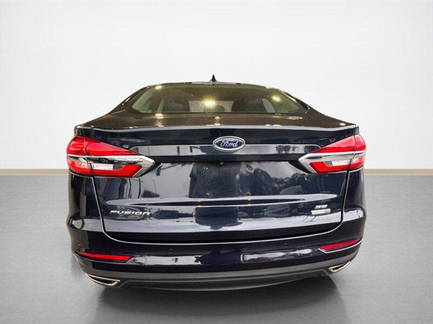 2020 Velocity Blue Ford Fusion SE (3FA6P0T90LR) with an EcoBoost 2.0L Turbo I4 245hp 275ft. lbs. engine, Automatic transmission, located at 25355 Eames Street, Channahon, IL, 60410, (815) 467-1807, 41.429108, -88.228432 - Introducing the sleek and stylish 2020 Ford Fusion SE in the eye-catching Alto Blue Metallic Tinted Clearcoat exterior and luxurious Ebony interior. Powered by a mighty EcoBoost 2.0L Turbo I4 engine, this baby churns out a whopping 245hp and 275ft. lbs. of torque. With less than 24,000 miles on the - Photo#4