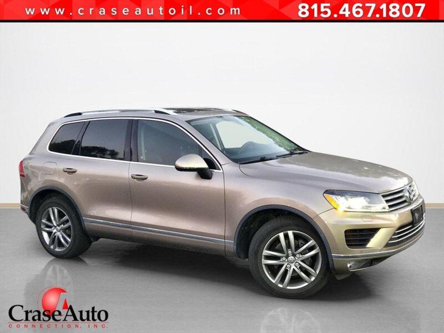 2016 Tan Volkswagen Touareg VR6 FSI Lux (WVGEF9BP1GD) with an 3.6L V6 280hp 266ft. lbs. engine, TipTronic transmission, located at 25355 Eames Street, Channahon, IL, 60410, (815) 467-1807, 41.429108, -88.228432 - ** LOCAL TRADE IN, WHOLESALE AS-IS SPECIAL, HAS OIL LEAKS AND NEEDS FUEL GUAGE SENSOR. ** Step into luxury with this 2016 Volkswagen Touareg VR6 FSI Lux. Powered by a robust 3.6L V6 engine delivering 280hp and 266ft. lbs. of torque, this SUV is ready to take on any adventure. The exterior features a - Photo#0