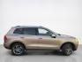 2016 Tan Volkswagen Touareg VR6 FSI Lux (WVGEF9BP1GD) with an 3.6L V6 280hp 266ft. lbs. engine, TipTronic transmission, located at 25355 Eames Street, Channahon, IL, 60410, (815) 467-1807, 41.429108, -88.228432 - ** LOCAL TRADE IN, WHOLESALE AS-IS SPECIAL, HAS OIL LEAKS AND NEEDS FUEL GUAGE SENSOR. ** Step into luxury with this 2016 Volkswagen Touareg VR6 FSI Lux. Powered by a robust 3.6L V6 engine delivering 280hp and 266ft. lbs. of torque, this SUV is ready to take on any adventure. The exterior features a - Photo#1