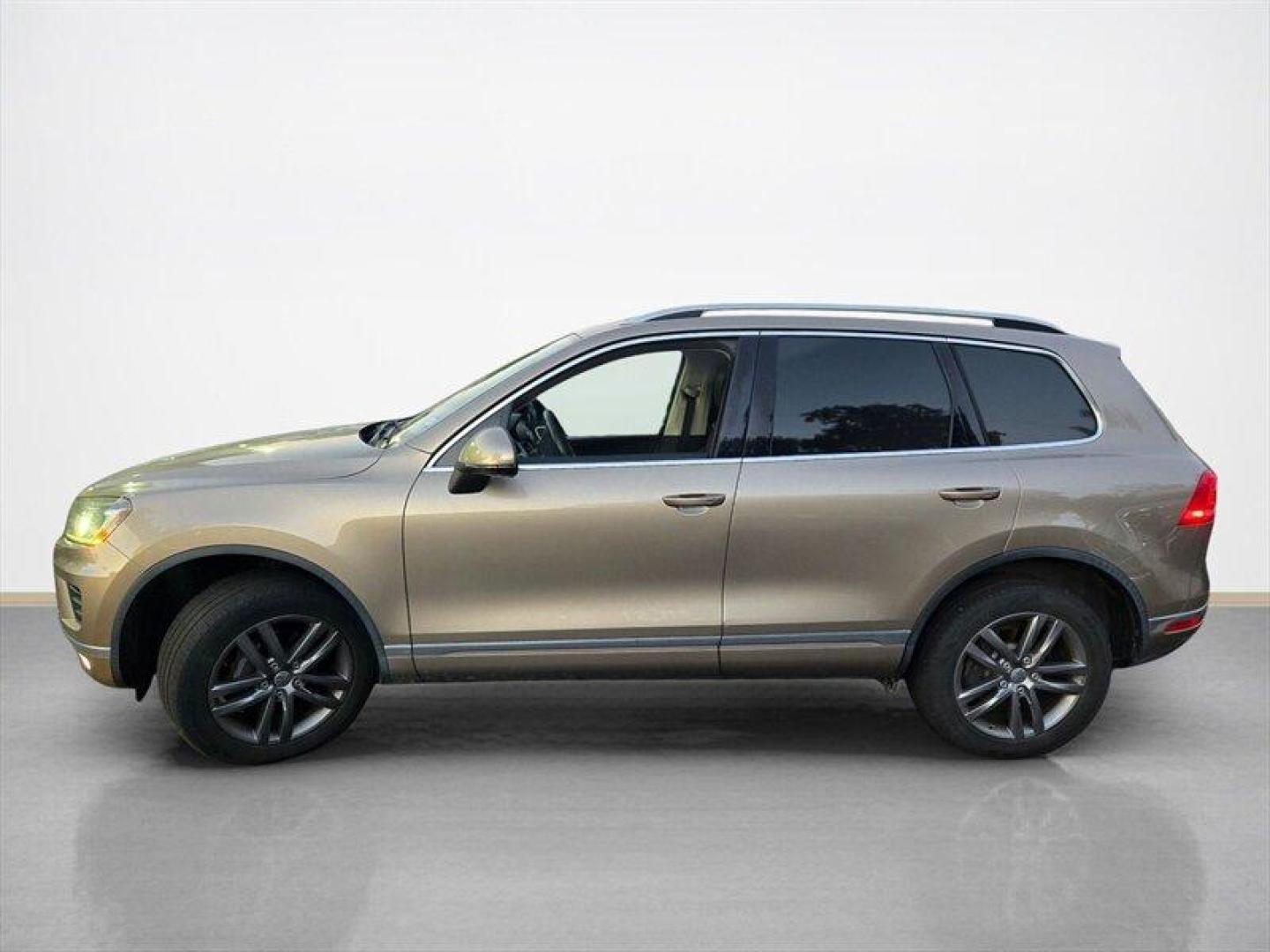 2016 Tan Volkswagen Touareg VR6 FSI Lux (WVGEF9BP1GD) with an 3.6L V6 280hp 266ft. lbs. engine, TipTronic transmission, located at 25355 Eames Street, Channahon, IL, 60410, (815) 467-1807, 41.429108, -88.228432 - ** LOCAL TRADE IN, WHOLESALE AS-IS SPECIAL, HAS OIL LEAKS AND NEEDS FUEL GUAGE SENSOR. ** Step into luxury with this 2016 Volkswagen Touareg VR6 FSI Lux. Powered by a robust 3.6L V6 engine delivering 280hp and 266ft. lbs. of torque, this SUV is ready to take on any adventure. The exterior features a - Photo#7