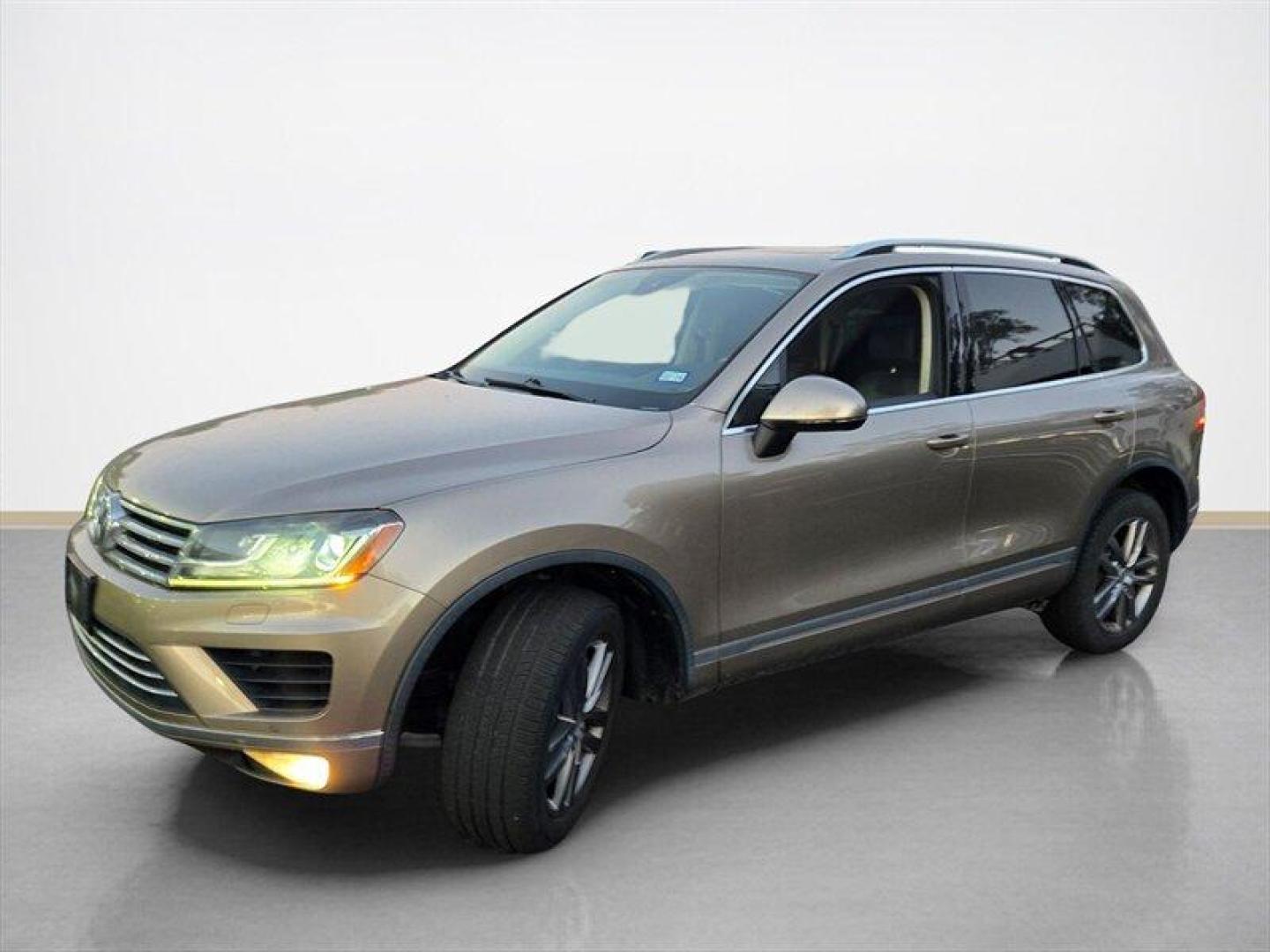 2016 Tan Volkswagen Touareg VR6 FSI Lux (WVGEF9BP1GD) with an 3.6L V6 280hp 266ft. lbs. engine, TipTronic transmission, located at 25355 Eames Street, Channahon, IL, 60410, (815) 467-1807, 41.429108, -88.228432 - ** LOCAL TRADE IN, WHOLESALE AS-IS SPECIAL, HAS OIL LEAKS AND NEEDS FUEL GUAGE SENSOR. ** Step into luxury with this 2016 Volkswagen Touareg VR6 FSI Lux. Powered by a robust 3.6L V6 engine delivering 280hp and 266ft. lbs. of torque, this SUV is ready to take on any adventure. The exterior features a - Photo#8