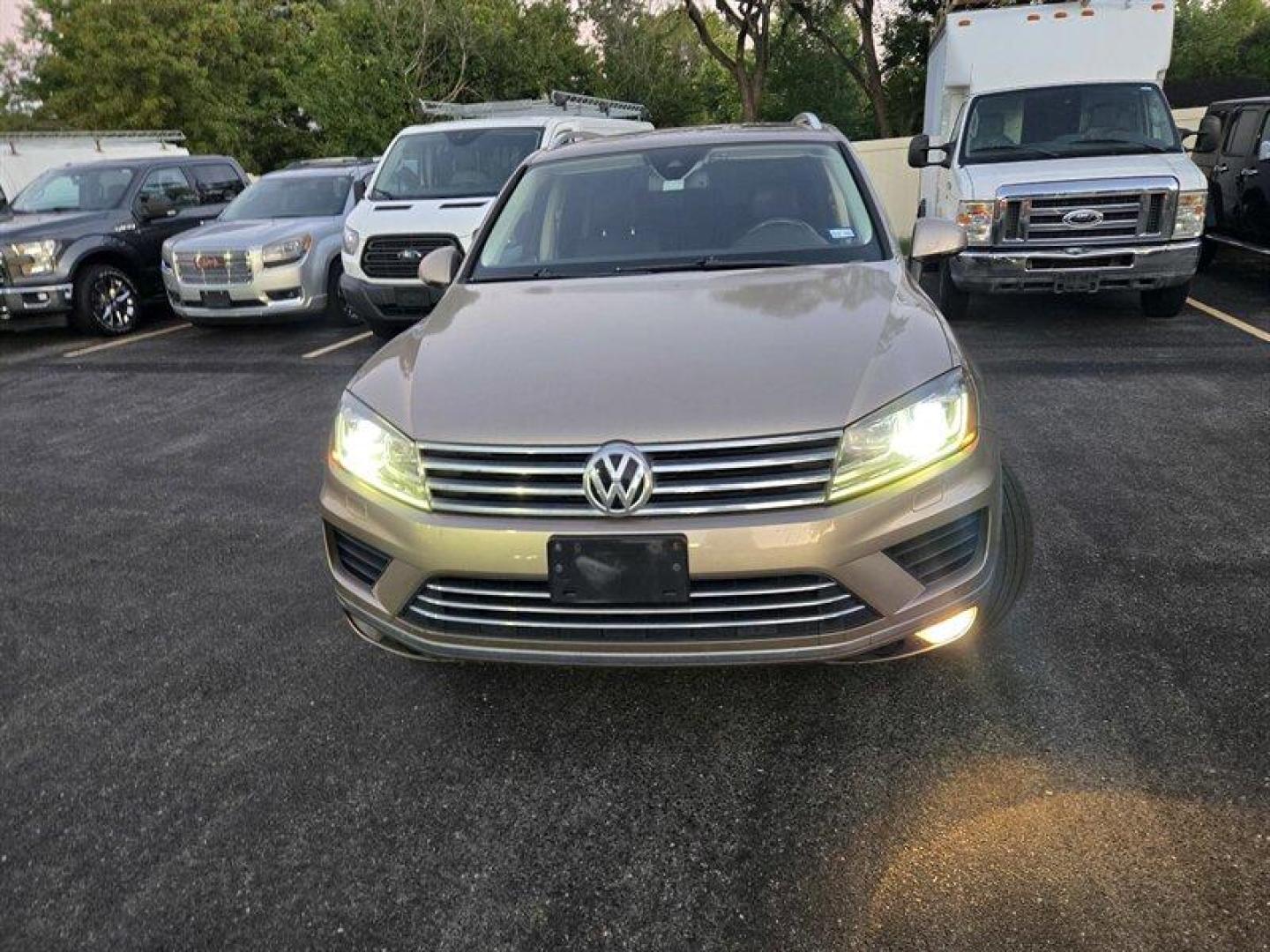 2016 Tan Volkswagen Touareg VR6 FSI Lux (WVGEF9BP1GD) with an 3.6L V6 280hp 266ft. lbs. engine, TipTronic transmission, located at 25355 Eames Street, Channahon, IL, 60410, (815) 467-1807, 41.429108, -88.228432 - ** LOCAL TRADE IN, WHOLESALE AS-IS SPECIAL, HAS OIL LEAKS AND NEEDS FUEL GUAGE SENSOR. ** Step into luxury with this 2016 Volkswagen Touareg VR6 FSI Lux. Powered by a robust 3.6L V6 engine delivering 280hp and 266ft. lbs. of torque, this SUV is ready to take on any adventure. The exterior features a - Photo#9