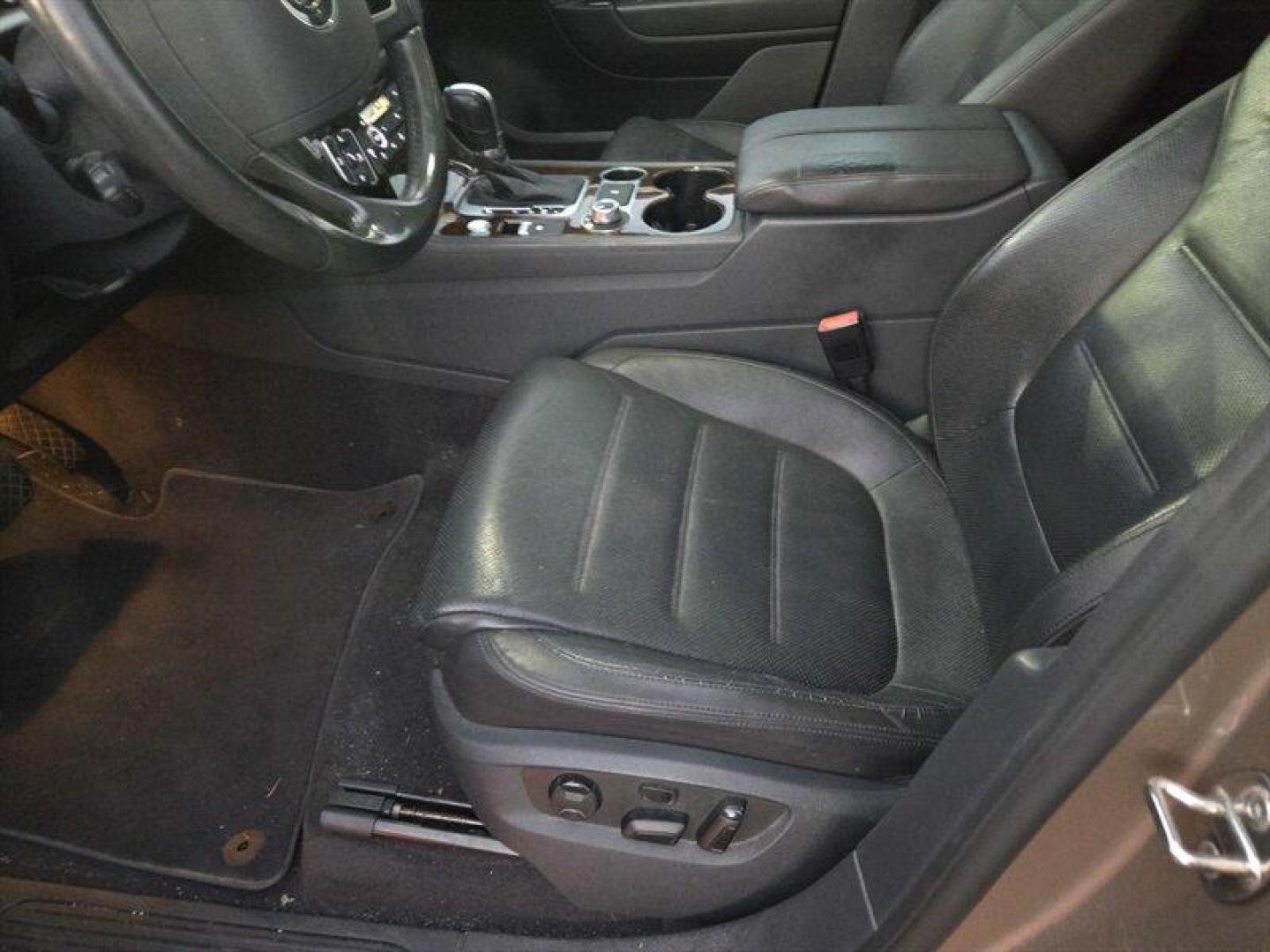 2016 Tan Volkswagen Touareg VR6 FSI Lux (WVGEF9BP1GD) with an 3.6L V6 280hp 266ft. lbs. engine, TipTronic transmission, located at 25355 Eames Street, Channahon, IL, 60410, (815) 467-1807, 41.429108, -88.228432 - ** LOCAL TRADE IN, WHOLESALE AS-IS SPECIAL, HAS OIL LEAKS AND NEEDS FUEL GUAGE SENSOR. ** Step into luxury with this 2016 Volkswagen Touareg VR6 FSI Lux. Powered by a robust 3.6L V6 engine delivering 280hp and 266ft. lbs. of torque, this SUV is ready to take on any adventure. The exterior features a - Photo#11