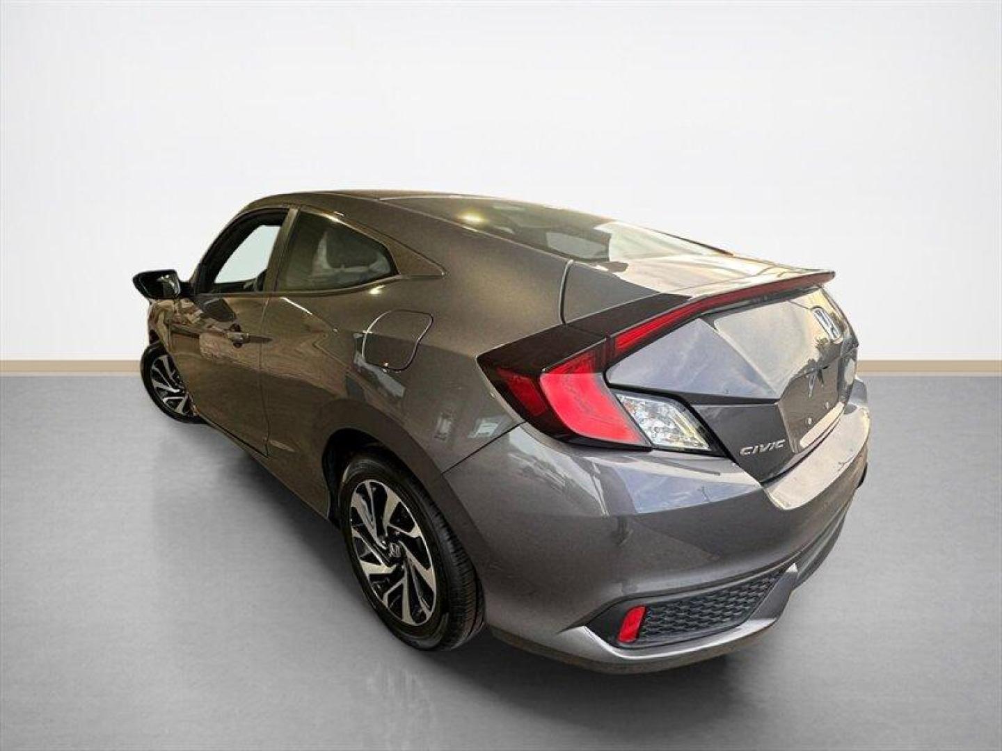 2016 Modern Steel Metallic Honda Civic LX (2HGFC4B56GH) with an 2.0L I4 158hp 138ft. lbs. engine, Automatic transmission, located at 25355 Eames Street, Channahon, IL, 60410, (815) 467-1807, 41.429108, -88.228432 - Step into the realm of excellence with the 2016 Honda Civic LX, a marvel of automotive engineering that combines power, efficiency, and style in perfect harmony. Beneath its sleek Crystal Black Pearl exterior lies a robust 2.0L I4 engine, generating an impressive 158hp and 138ft. lbs. of torque to e - Photo#5