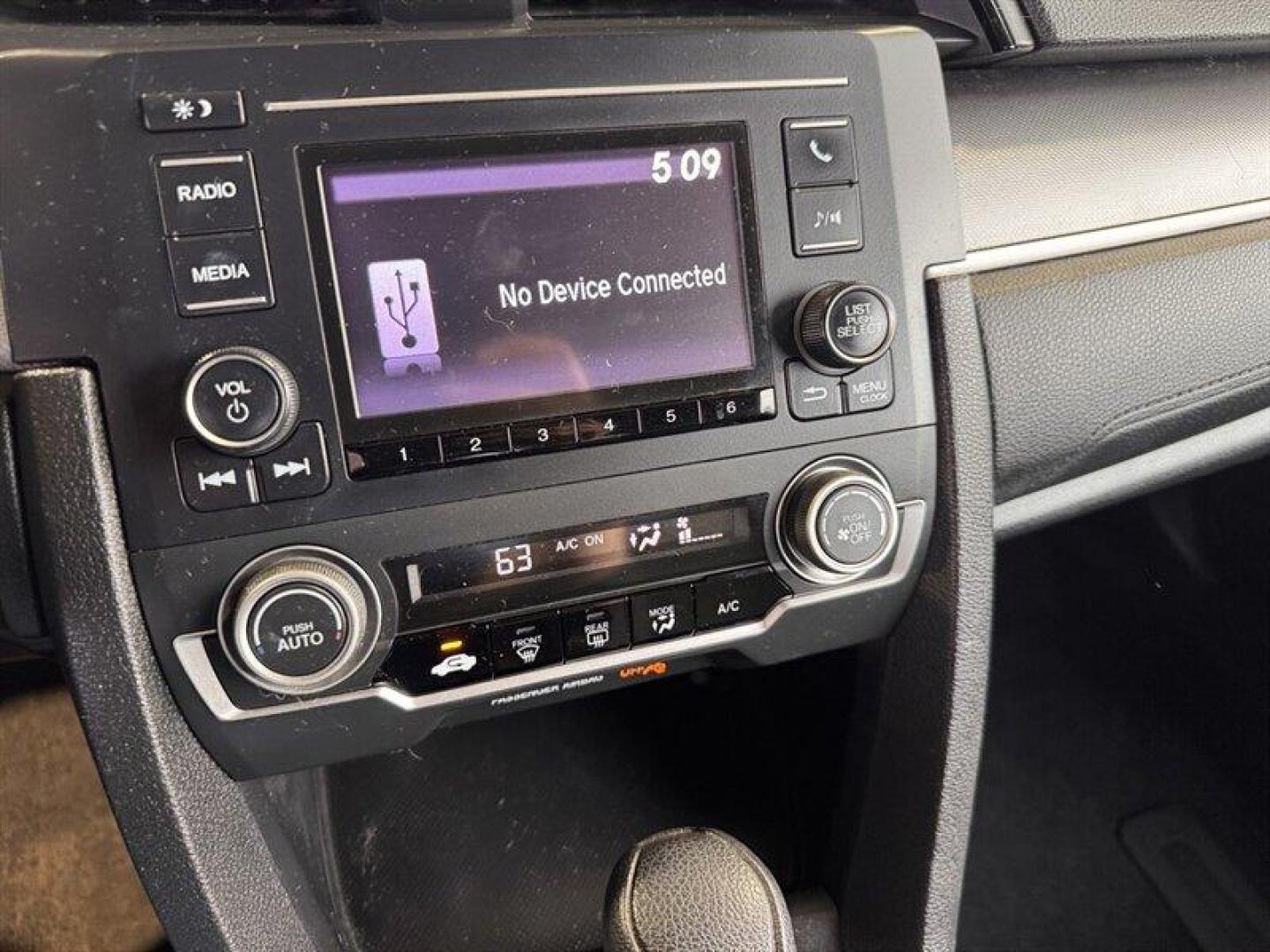 2016 Modern Steel Metallic Honda Civic LX (2HGFC4B56GH) with an 2.0L I4 158hp 138ft. lbs. engine, Automatic transmission, located at 25355 Eames Street, Channahon, IL, 60410, (815) 467-1807, 41.429108, -88.228432 - Step into the realm of excellence with the 2016 Honda Civic LX, a marvel of automotive engineering that combines power, efficiency, and style in perfect harmony. Beneath its sleek Crystal Black Pearl exterior lies a robust 2.0L I4 engine, generating an impressive 158hp and 138ft. lbs. of torque to e - Photo#16
