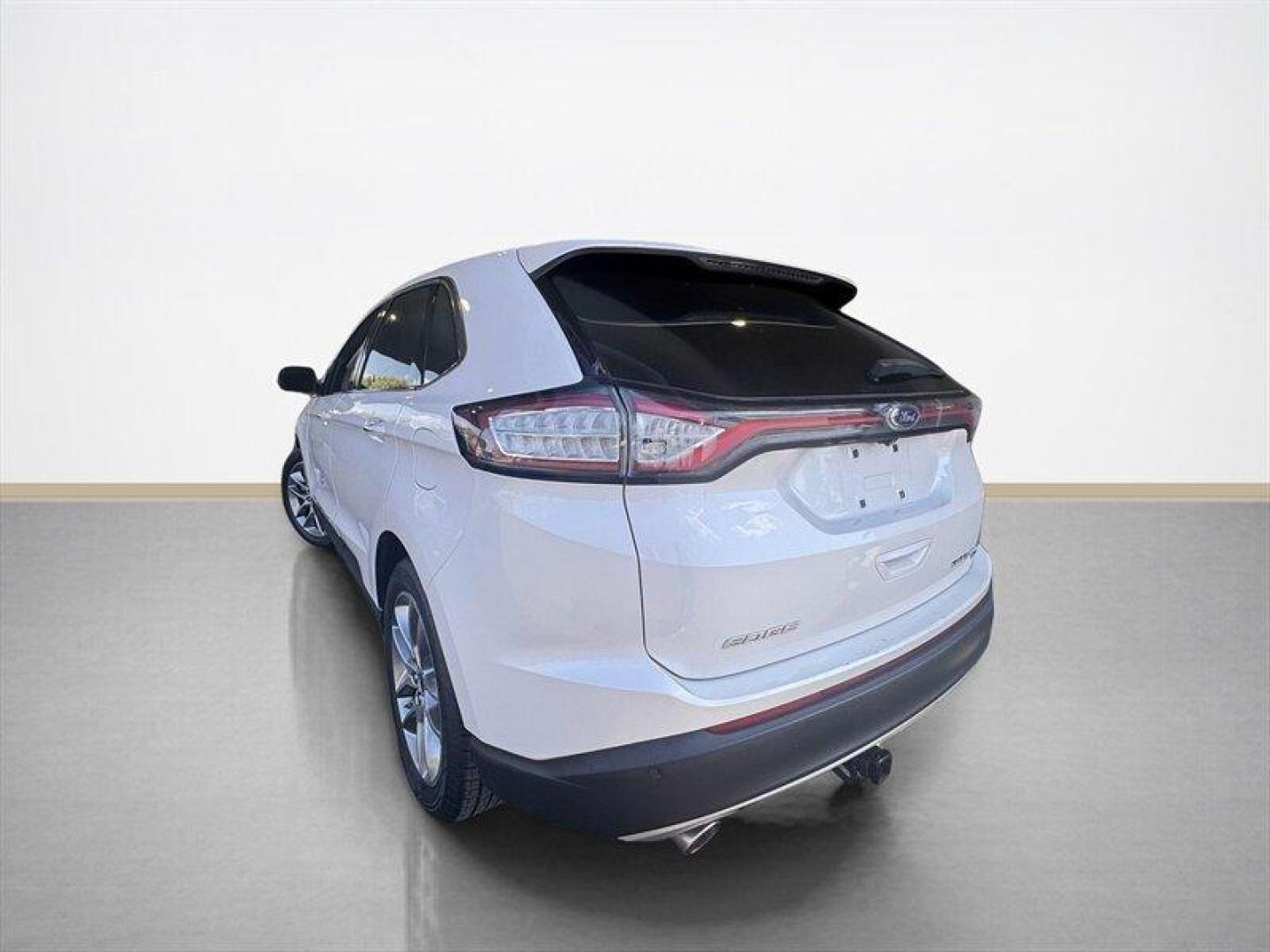 2015 White Platinum Metallic Tri-Coat Ford Edge Titanium (2FMTK4K8XFB) with an 3.5L V6 280hp 250ft. lbs. engine, Automatic transmission, located at 25355 Eames Street, Channahon, IL, 60410, (815) 467-1807, 41.429108, -88.228432 - Introducing the sophisticated 2015 Ford Edge Titanium, a remarkable SUV that seamlessly combines power and elegance. Equipped with a robust 3.5L V6 engine delivering 280hp and 250ft. lbs. of torque, this vehicle offers a dynamic driving experience. The factory default features of this Ford Edge Tit - Photo#5