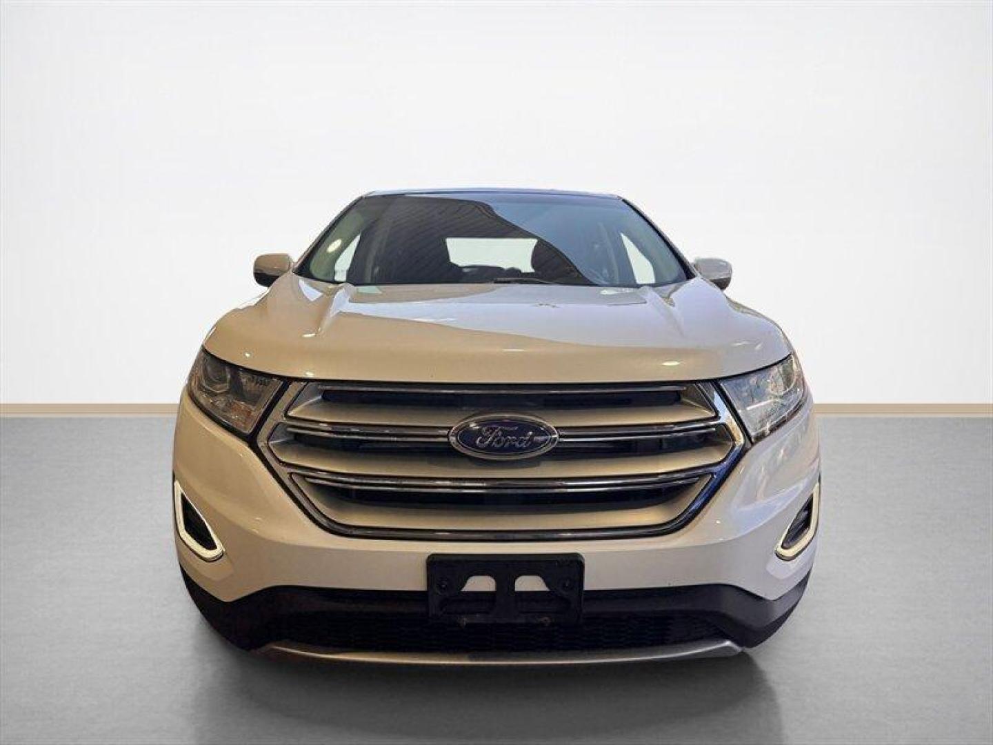 2015 White Platinum Metallic Tri-Coat Ford Edge Titanium (2FMTK4K8XFB) with an 3.5L V6 280hp 250ft. lbs. engine, Automatic transmission, located at 25355 Eames Street, Channahon, IL, 60410, (815) 467-1807, 41.429108, -88.228432 - Introducing the sophisticated 2015 Ford Edge Titanium, a remarkable SUV that seamlessly combines power and elegance. Equipped with a robust 3.5L V6 engine delivering 280hp and 250ft. lbs. of torque, this vehicle offers a dynamic driving experience. The factory default features of this Ford Edge Tit - Photo#8