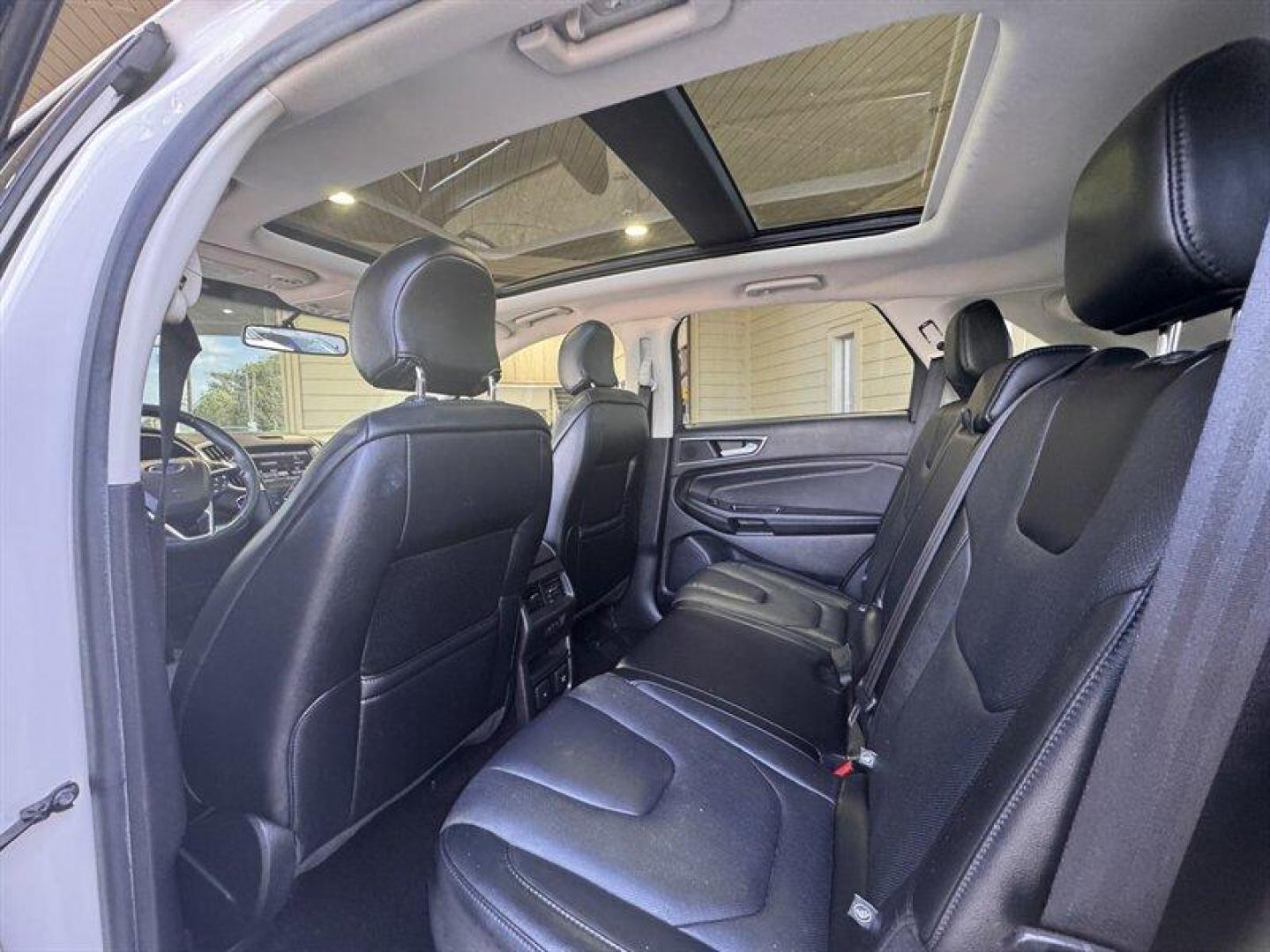 2015 White Platinum Metallic Tri-Coat Ford Edge Titanium (2FMTK4K8XFB) with an 3.5L V6 280hp 250ft. lbs. engine, Automatic transmission, located at 25355 Eames Street, Channahon, IL, 60410, (815) 467-1807, 41.429108, -88.228432 - Introducing the sophisticated 2015 Ford Edge Titanium, a remarkable SUV that seamlessly combines power and elegance. Equipped with a robust 3.5L V6 engine delivering 280hp and 250ft. lbs. of torque, this vehicle offers a dynamic driving experience. The factory default features of this Ford Edge Tit - Photo#12