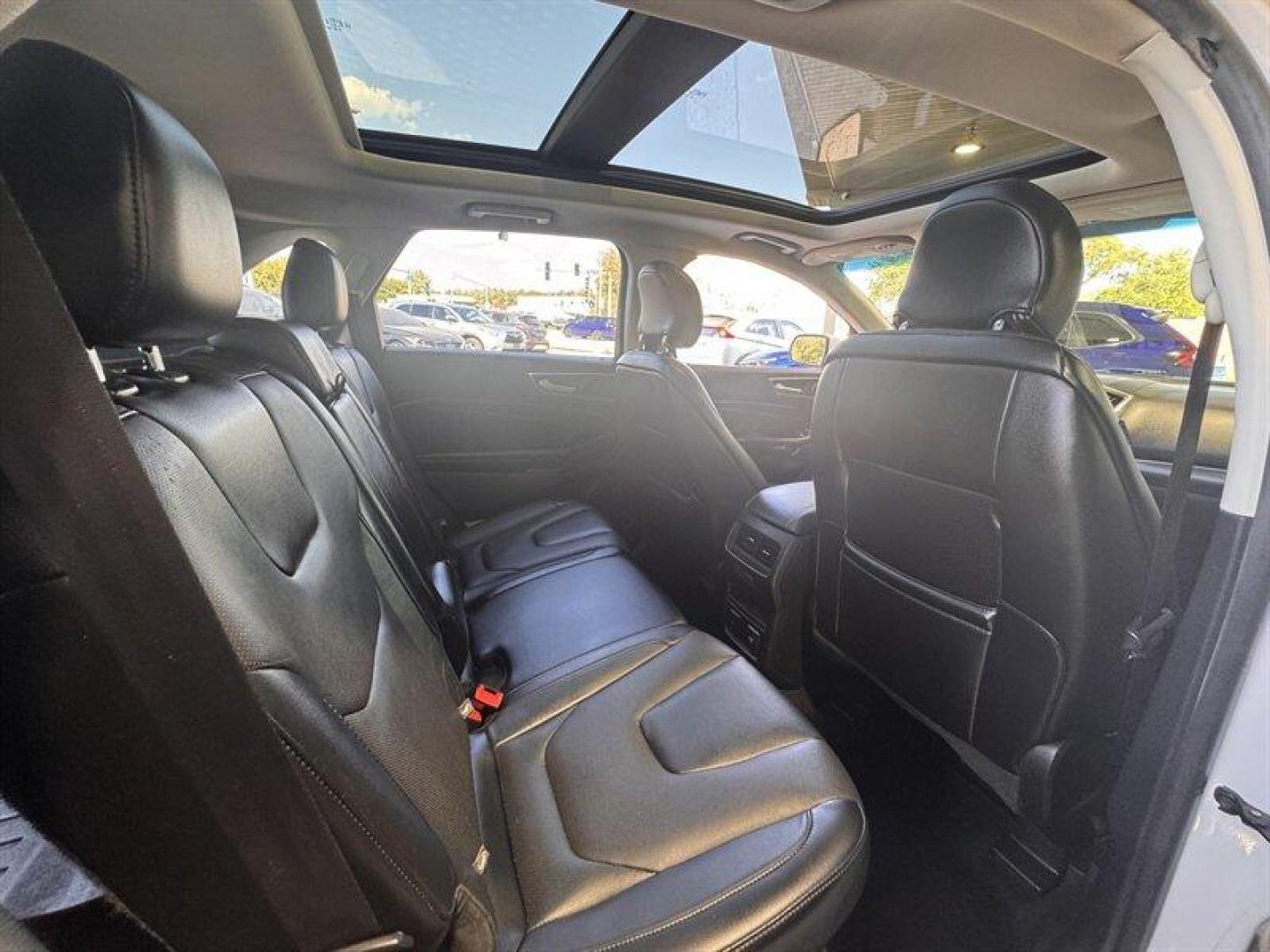 2015 White Platinum Metallic Tri-Coat Ford Edge Titanium (2FMTK4K8XFB) with an 3.5L V6 280hp 250ft. lbs. engine, Automatic transmission, located at 25355 Eames Street, Channahon, IL, 60410, (815) 467-1807, 41.429108, -88.228432 - Introducing the sophisticated 2015 Ford Edge Titanium, a remarkable SUV that seamlessly combines power and elegance. Equipped with a robust 3.5L V6 engine delivering 280hp and 250ft. lbs. of torque, this vehicle offers a dynamic driving experience. The factory default features of this Ford Edge Tit - Photo#14