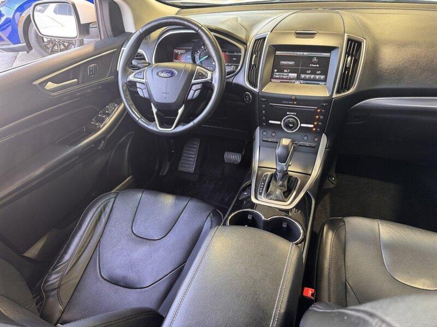 2015 White Platinum Metallic Tri-Coat Ford Edge Titanium (2FMTK4K8XFB) with an 3.5L V6 280hp 250ft. lbs. engine, Automatic transmission, located at 25355 Eames Street, Channahon, IL, 60410, (815) 467-1807, 41.429108, -88.228432 - Introducing the sophisticated 2015 Ford Edge Titanium, a remarkable SUV that seamlessly combines power and elegance. Equipped with a robust 3.5L V6 engine delivering 280hp and 250ft. lbs. of torque, this vehicle offers a dynamic driving experience. The factory default features of this Ford Edge Tit - Photo#16