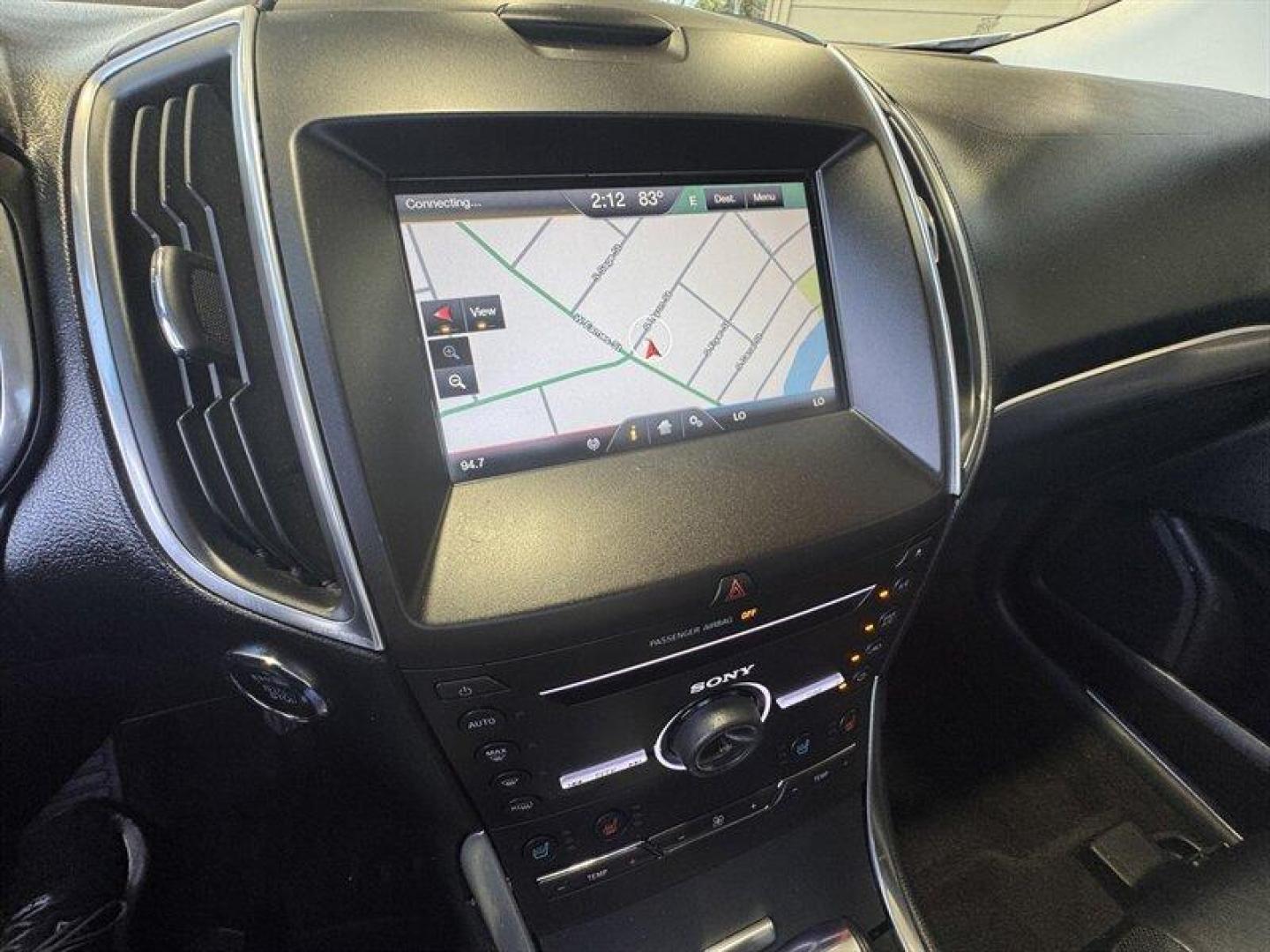 2015 White Platinum Metallic Tri-Coat Ford Edge Titanium (2FMTK4K8XFB) with an 3.5L V6 280hp 250ft. lbs. engine, Automatic transmission, located at 25355 Eames Street, Channahon, IL, 60410, (815) 467-1807, 41.429108, -88.228432 - Introducing the sophisticated 2015 Ford Edge Titanium, a remarkable SUV that seamlessly combines power and elegance. Equipped with a robust 3.5L V6 engine delivering 280hp and 250ft. lbs. of torque, this vehicle offers a dynamic driving experience. The factory default features of this Ford Edge Tit - Photo#18