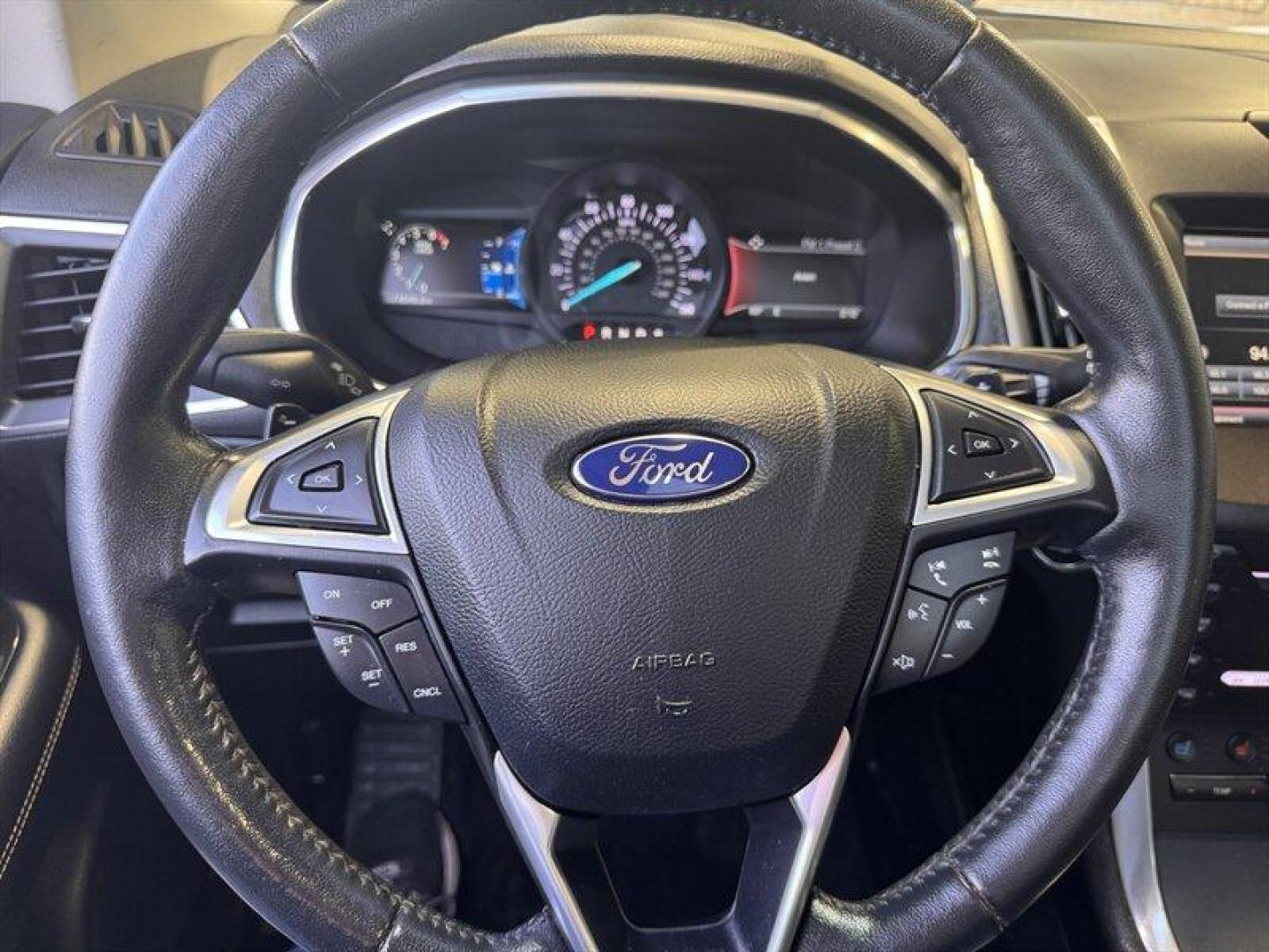 2015 White Platinum Metallic Tri-Coat Ford Edge Titanium (2FMTK4K8XFB) with an 3.5L V6 280hp 250ft. lbs. engine, Automatic transmission, located at 25355 Eames Street, Channahon, IL, 60410, (815) 467-1807, 41.429108, -88.228432 - Introducing the sophisticated 2015 Ford Edge Titanium, a remarkable SUV that seamlessly combines power and elegance. Equipped with a robust 3.5L V6 engine delivering 280hp and 250ft. lbs. of torque, this vehicle offers a dynamic driving experience. The factory default features of this Ford Edge Tit - Photo#23