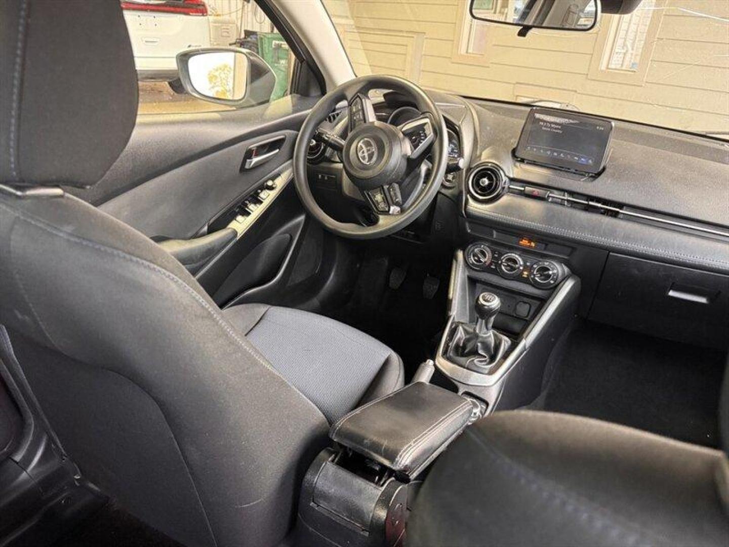 2019 Frost Toyota Yaris L (3MYDLBYV7KY) with an 1.5L I4 106hp 103ft. lbs. engine, 6 Speed Manual transmission, located at 25355 Eames Street, Channahon, IL, 60410, (815) 467-1807, 41.429108, -88.228432 - Introducing the 2019 Toyota Yaris L, a compact car that perfectly balances style, efficiency, and fun. With its eye-catching Frost exterior, this Yaris stands out on the road, embodying a fresh and modern vibe. The sleek design features flowing lines and a sporty stance, making it not just a mode of - Photo#16