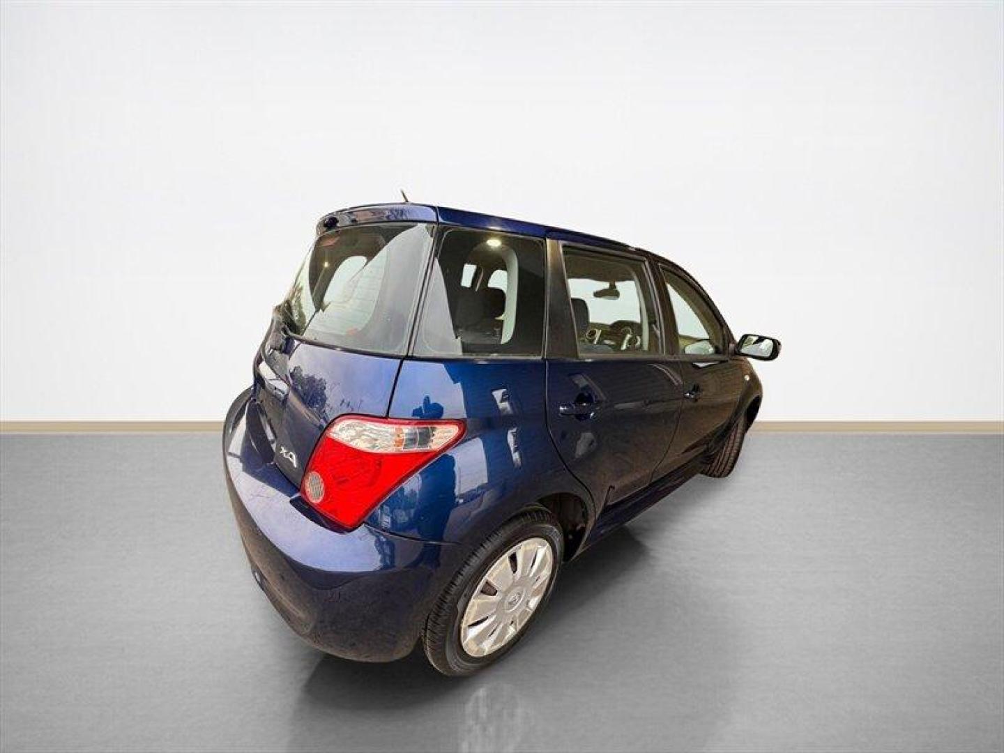 2006 Indigo Ink Pearl Scion xA (JTKKT624460) with an 1L NA I4 double overhead cam (DOHC) 16V engine, 5 Speed Manual transmission, located at 25355 Eames Street, Channahon, IL, 60410, (815) 467-1807, 41.429108, -88.228432 - Introducing the remarkable 2006 Scion xA, a masterclass in compact automotive engineering that harmoniously blends style, efficiency, and functionality. With an impressively low mileage of under 55,000 milesaveraging a mere 3,000 miles per yearthis gem is a testament to longevity and care, promising - Photo#3