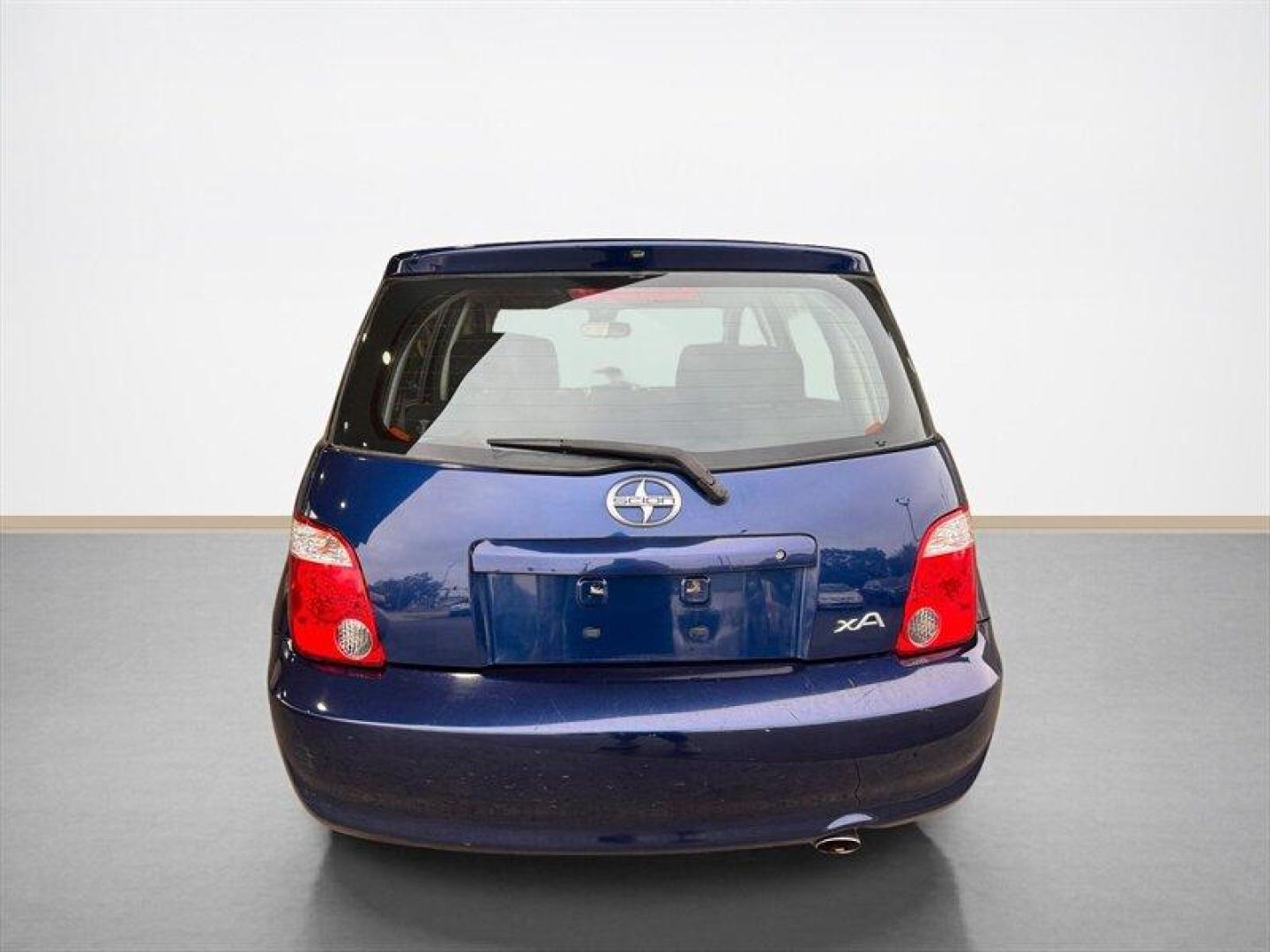 2006 Indigo Ink Pearl Scion xA (JTKKT624460) with an 1L NA I4 double overhead cam (DOHC) 16V engine, 5 Speed Manual transmission, located at 25355 Eames Street, Channahon, IL, 60410, (815) 467-1807, 41.429108, -88.228432 - Introducing the remarkable 2006 Scion xA, a masterclass in compact automotive engineering that harmoniously blends style, efficiency, and functionality. With an impressively low mileage of under 55,000 milesaveraging a mere 3,000 miles per yearthis gem is a testament to longevity and care, promising - Photo#4