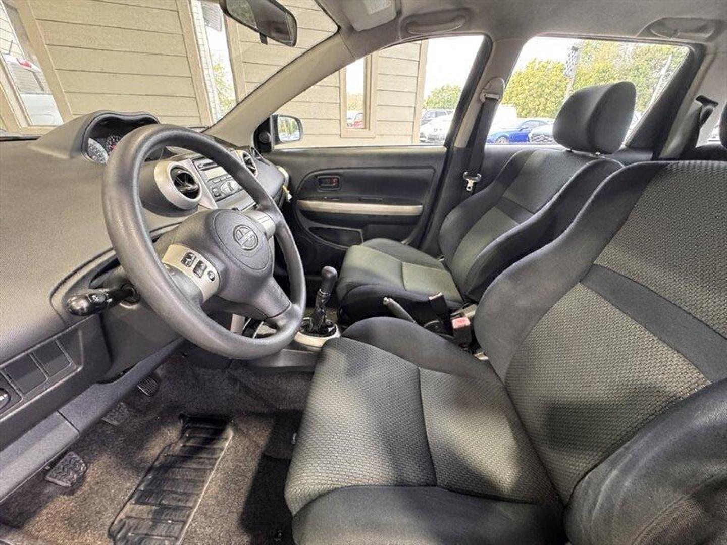 2006 Indigo Ink Pearl Scion xA (JTKKT624460) with an 1L NA I4 double overhead cam (DOHC) 16V engine, 5 Speed Manual transmission, located at 25355 Eames Street, Channahon, IL, 60410, (815) 467-1807, 41.429108, -88.228432 - Introducing the remarkable 2006 Scion xA, a masterclass in compact automotive engineering that harmoniously blends style, efficiency, and functionality. With an impressively low mileage of under 55,000 milesaveraging a mere 3,000 miles per yearthis gem is a testament to longevity and care, promising - Photo#11