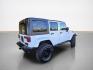 2017 Bright White Clear Coat Jeep Wrangler Unlimited Sahara (1C4BJWEG7HL) with an 3.6L V6 285hp 260ft. lbs. engine, Automatic transmission, located at 25355 Eames Street, Channahon, IL, 60410, (815) 467-1807, 41.429108, -88.228432 - **2017 Jeep Wrangler Unlimited Sahara: A Masterpiece of Adventure Awaits!** Prepare to embark on your next grand escapade with the 2017 Jeep Wrangler Unlimited Sahara, an iconic symbol of rugged capability and unyielding spirit. Dressed in a striking Bright White Clear Coat, this exceptional SUV co - Photo#3