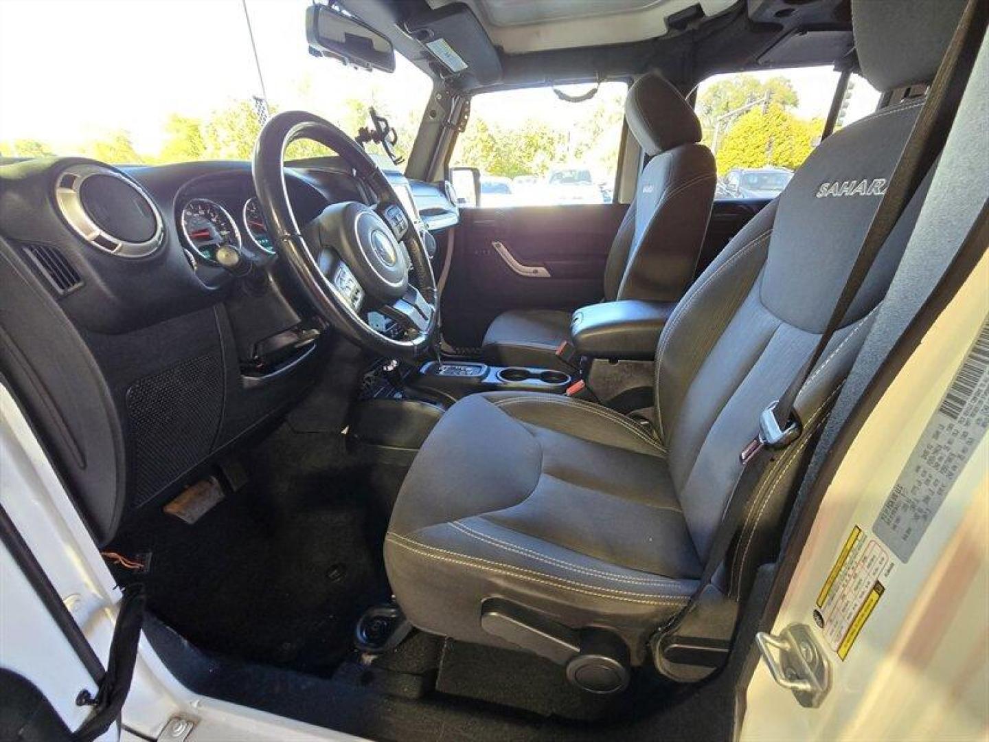 2017 Bright White Clear Coat Jeep Wrangler Unlimited Sahara (1C4BJWEG7HL) with an 3.6L V6 285hp 260ft. lbs. engine, Automatic transmission, located at 25355 Eames Street, Channahon, IL, 60410, (815) 467-1807, 41.429108, -88.228432 - **2017 Jeep Wrangler Unlimited Sahara: A Masterpiece of Adventure Awaits!** Prepare to embark on your next grand escapade with the 2017 Jeep Wrangler Unlimited Sahara, an iconic symbol of rugged capability and unyielding spirit. Dressed in a striking Bright White Clear Coat, this exceptional SUV co - Photo#9