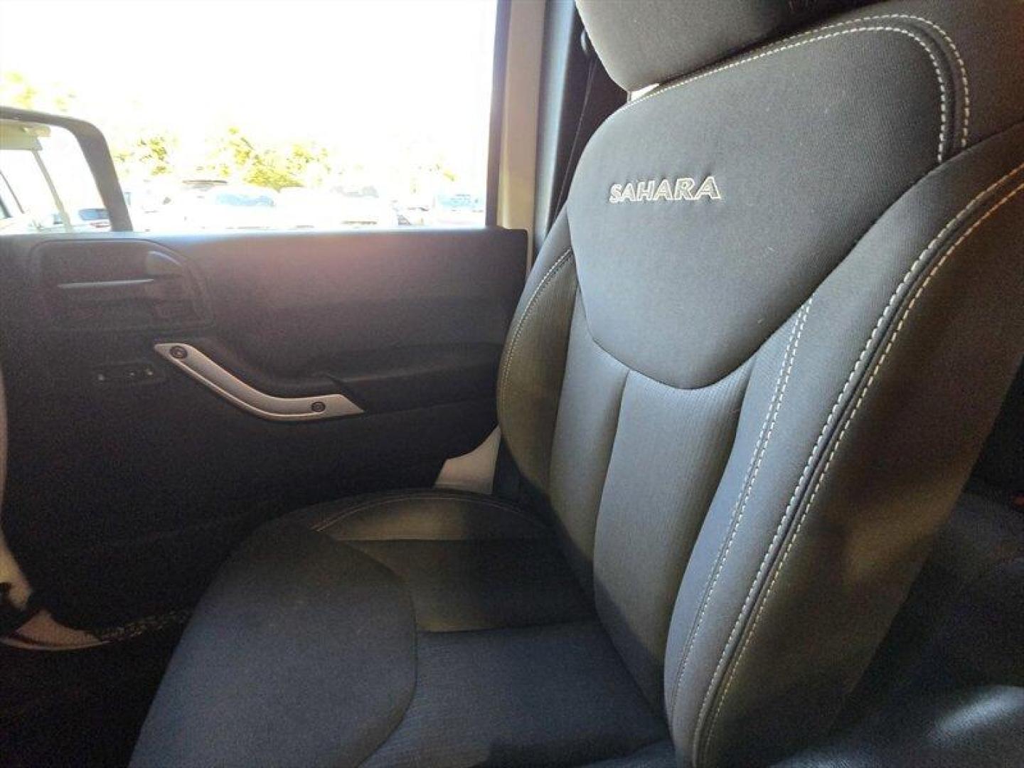 2017 Bright White Clear Coat Jeep Wrangler Unlimited Sahara (1C4BJWEG7HL) with an 3.6L V6 285hp 260ft. lbs. engine, Automatic transmission, located at 25355 Eames Street, Channahon, IL, 60410, (815) 467-1807, 41.429108, -88.228432 - **2017 Jeep Wrangler Unlimited Sahara: A Masterpiece of Adventure Awaits!** Prepare to embark on your next grand escapade with the 2017 Jeep Wrangler Unlimited Sahara, an iconic symbol of rugged capability and unyielding spirit. Dressed in a striking Bright White Clear Coat, this exceptional SUV co - Photo#17