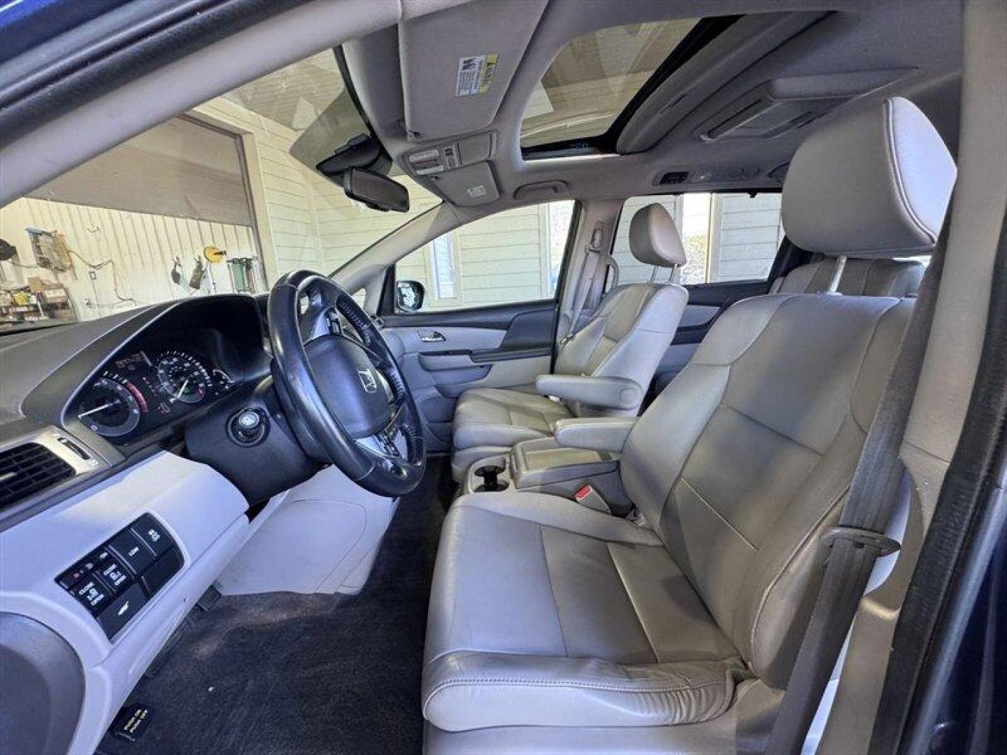 2014 Obsidian Blue Pearl Honda Odyssey EX-L (5FNRL5H66EB) with an 3.5L V6 248hp 250ft. lbs. engine, Automatic transmission, located at 25355 Eames Street, Channahon, IL, 60410, (815) 467-1807, 41.429108, -88.228432 - Introducing the 2014 Honda Odyssey EX-L the ultimate family-friendly minivan that combines comfort, style, and reliability! Dressed in a stunning Crystal Black Pearl exterior, this Odyssey stands out with its sleek and modern design, making every drive a stylish affair. Under the hood, you'll find - Photo#11