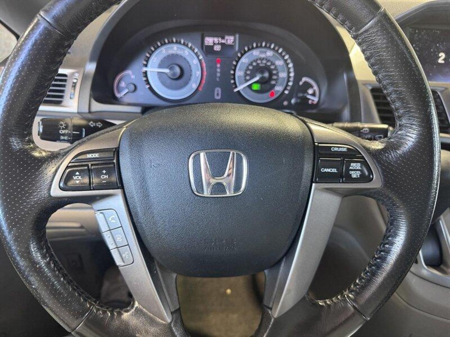 2014 Obsidian Blue Pearl Honda Odyssey EX-L (5FNRL5H66EB) with an 3.5L V6 248hp 250ft. lbs. engine, Automatic transmission, located at 25355 Eames Street, Channahon, IL, 60410, (815) 467-1807, 41.429108, -88.228432 - Introducing the 2014 Honda Odyssey EX-L the ultimate family-friendly minivan that combines comfort, style, and reliability! Dressed in a stunning Crystal Black Pearl exterior, this Odyssey stands out with its sleek and modern design, making every drive a stylish affair. Under the hood, you'll find - Photo#25