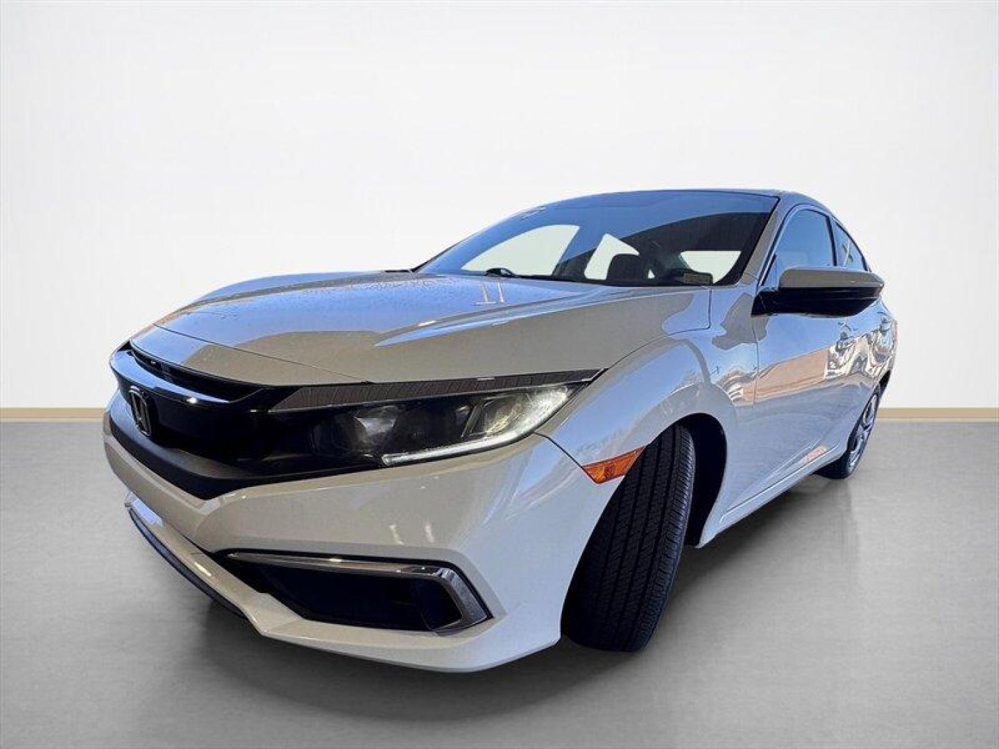 2019 Platinum White Pearl Honda Civic LX (19XFC2F68KE) with an 2.0L I4 158hp 138ft. lbs. engine, Automatic transmission, located at 25355 Eames Street, Channahon, IL, 60410, (815) 467-1807, 41.429108, -88.228432 - Get ready to fall in love with the 2019 Honda Civic LXa compact car thats not just about looks; its the full package! With a peppy 2.0L I4 engine packing 158 horsepower and a torque of 138 ft-lbs, this little beast knows how to make your morning commute feel like a joyride. And with fewer than 58,00 - Photo#7
