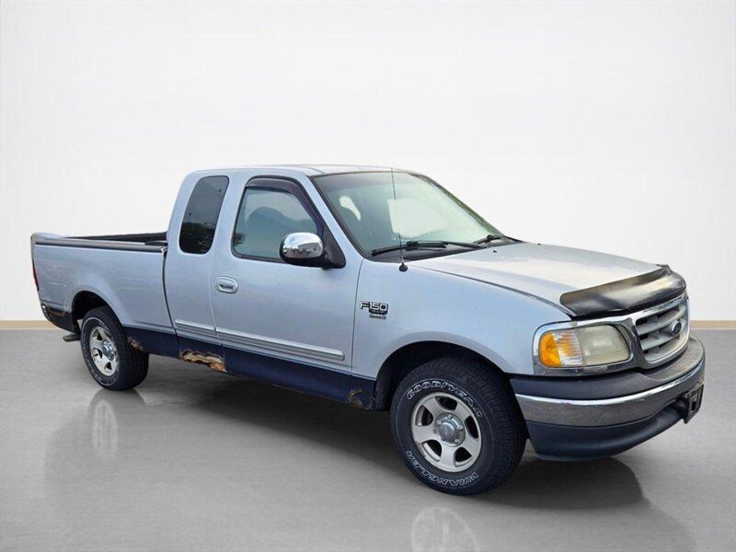 2000 Chestnut Clear Coat Metallic Ford F-150 XLT (1FTRX17L5YN) with an Triton 5.4L V8 260hp 350ft. lbs. engine, Automatic transmission, located at 25355 Eames Street, Channahon, IL, 60410, (815) 467-1807, 41.429108, -88.228432 - ** LOCAL TRADE IN, WHOLESALE AS-IS SPECIAL. HAS RUST BUT RUNS WELL. ** Discover the 2000 Ford F-150 XLT, a reliable and versatile pickup truck that has stood the test of time. Powered by a robust Triton 5.4L V8 engine, this vehicle generates an impressive 260 horsepower and 350 ft-lbs of torque, ma - Photo#7