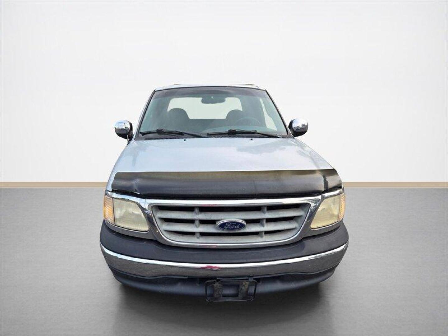 2000 Chestnut Clear Coat Metallic Ford F-150 XLT (1FTRX17L5YN) with an Triton 5.4L V8 260hp 350ft. lbs. engine, Automatic transmission, located at 25355 Eames Street, Channahon, IL, 60410, (815) 467-1807, 41.429108, -88.228432 - ** LOCAL TRADE IN, WHOLESALE AS-IS SPECIAL. HAS RUST BUT RUNS WELL. ** Discover the 2000 Ford F-150 XLT, a reliable and versatile pickup truck that has stood the test of time. Powered by a robust Triton 5.4L V8 engine, this vehicle generates an impressive 260 horsepower and 350 ft-lbs of torque, ma - Photo#8